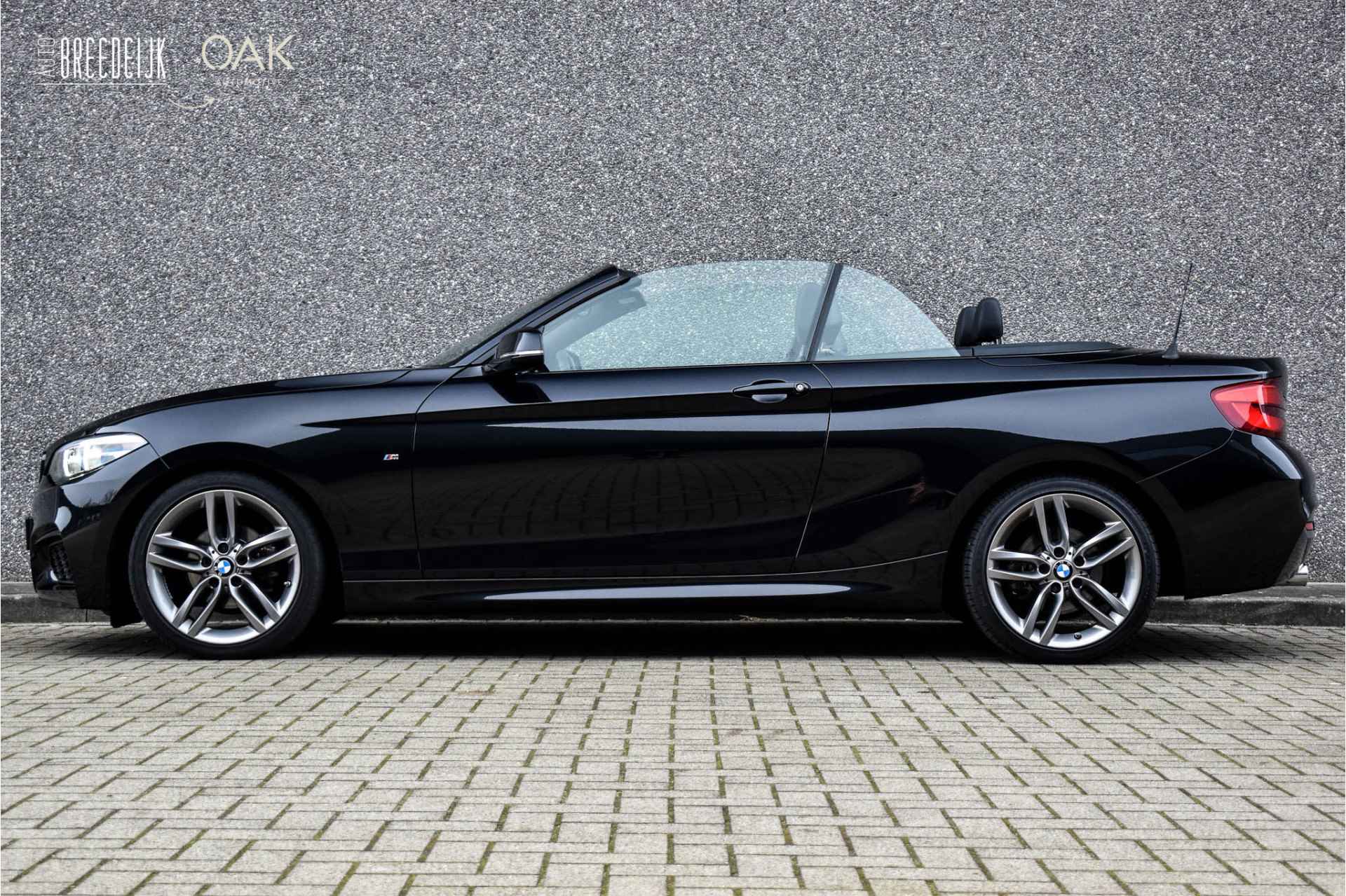 BMW 2 Serie Cabrio 218i Aut. | M-Sport | NaviProf | Leder | Xenon | 18"LM | NL Auto | Sapphire Zwart - 10/23