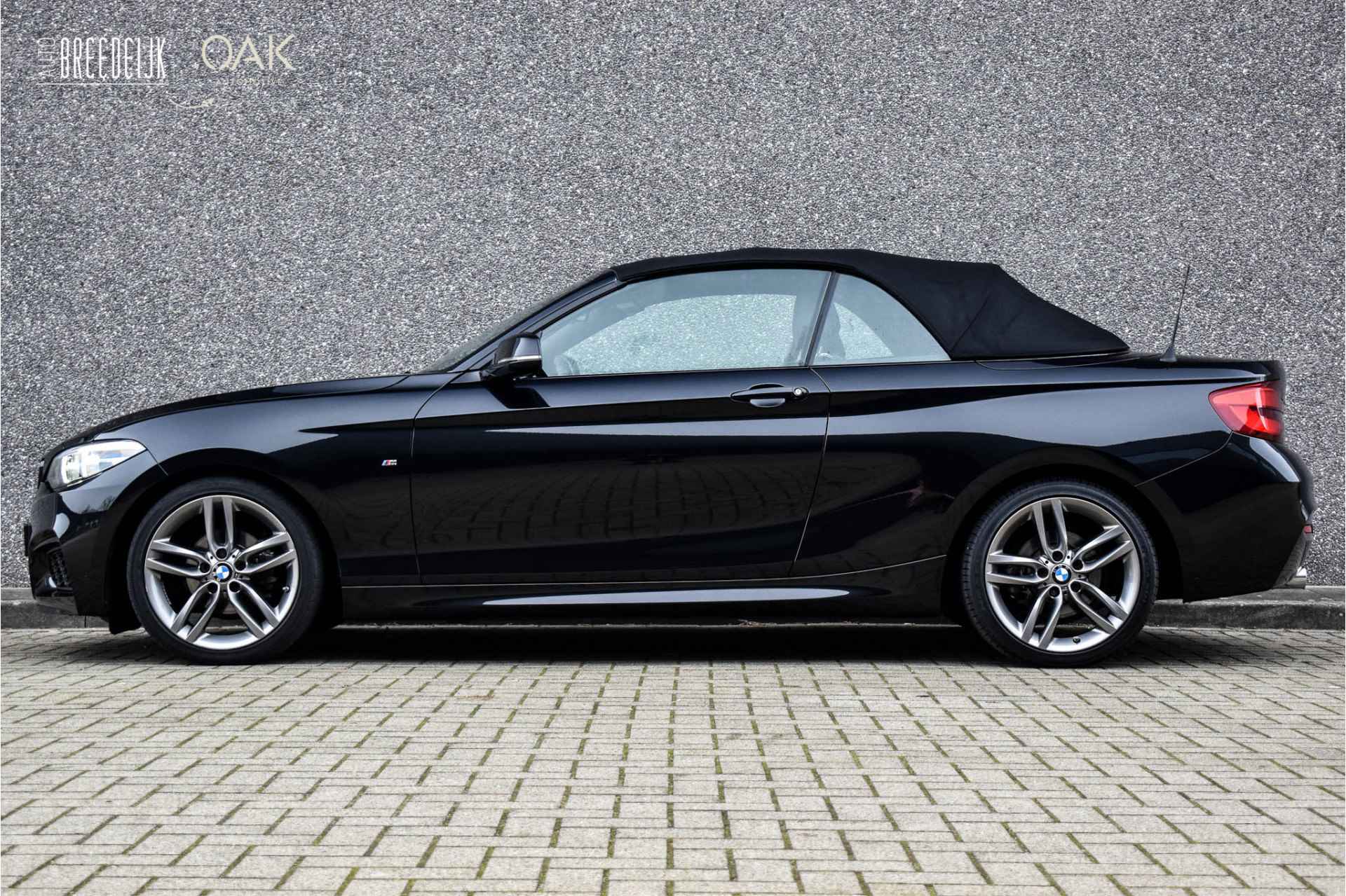 BMW 2 Serie Cabrio 218i Aut. | M-Sport | NaviProf | Leder | Xenon | 18"LM | NL Auto | Sapphire Zwart - 11/23