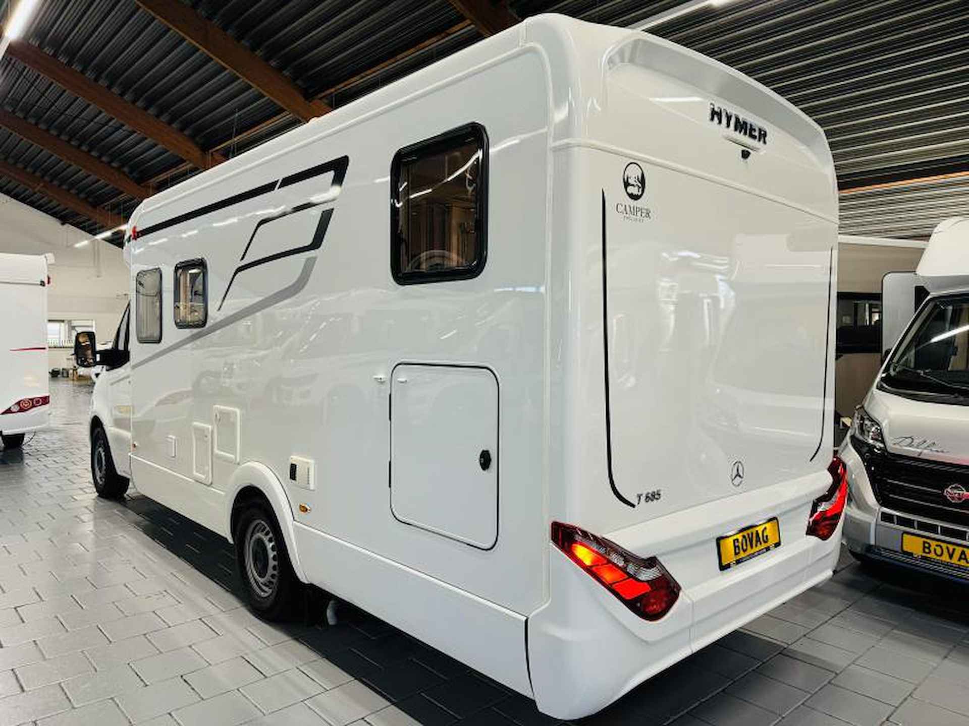 Hymer Tramp 685 S Automaat Enkele bedden - 8/25