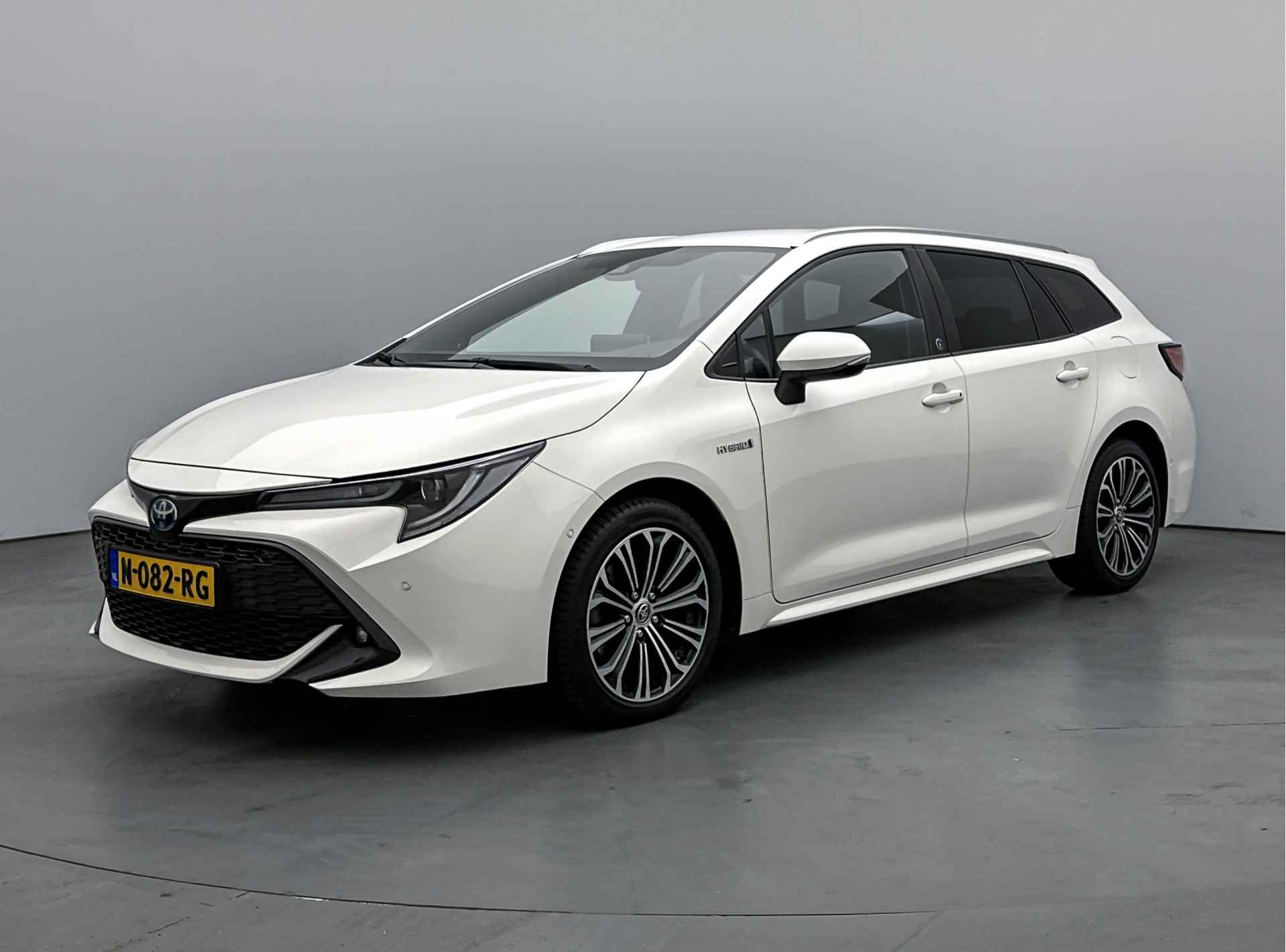 Toyota Corolla Touring Sports 2.0 Hybrid Dynamic Limited | Parkeersensor voor en achter | WInter pakket | Dodehoek Ass. | Stoel en stuurwiel verwarmd | - 18/48