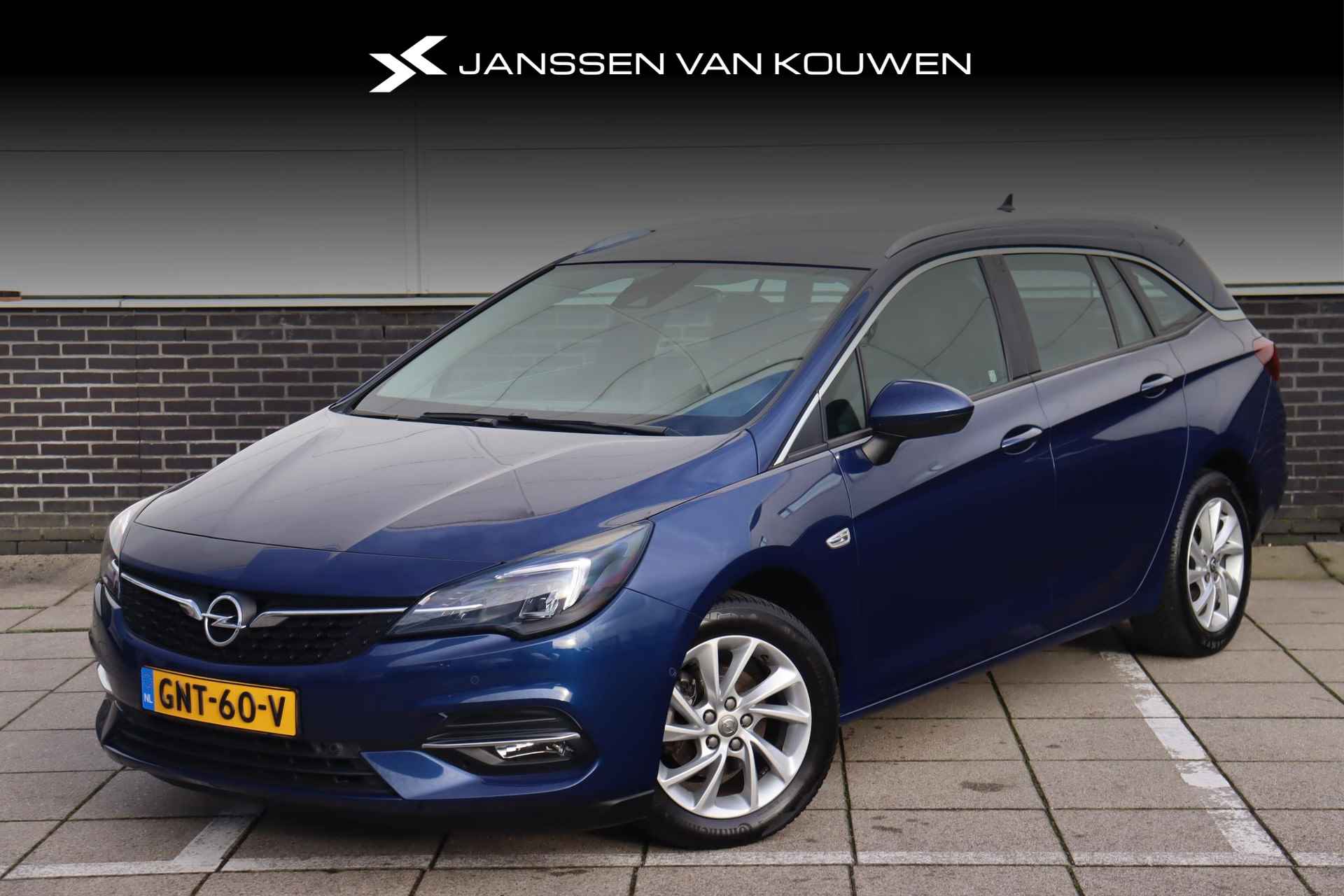 Opel Astra Sports Tourer 1.2 Elegance *Climate * Stuur-Stoelverwarming * All Season Banden - 1/44