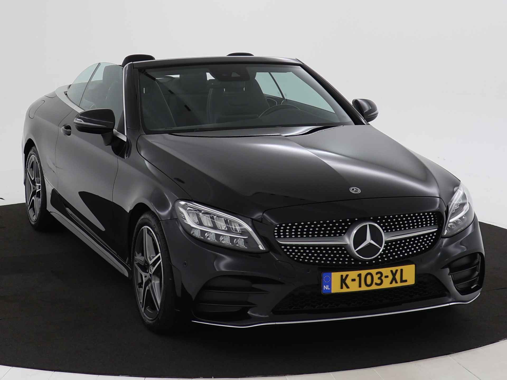 Mercedes-Benz C-Klasse Cabrio 180 AMG | Achteruitrijcamera | Sfeerverlichting | Stoel- + nekverwarming | Apple Carplay | Inclusief 24 maanden MB Certified garantie voor Europa. - 28/47