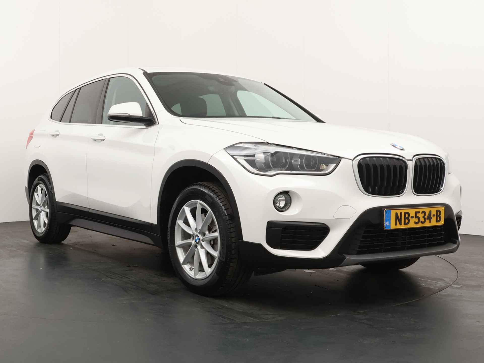 BMW X1 sDrive18i Centennial High Executive - Cruise Control  - Climate Control - LED - Navigatie - Lichtmetalen Velgen - Bovag Garantie - 11/43