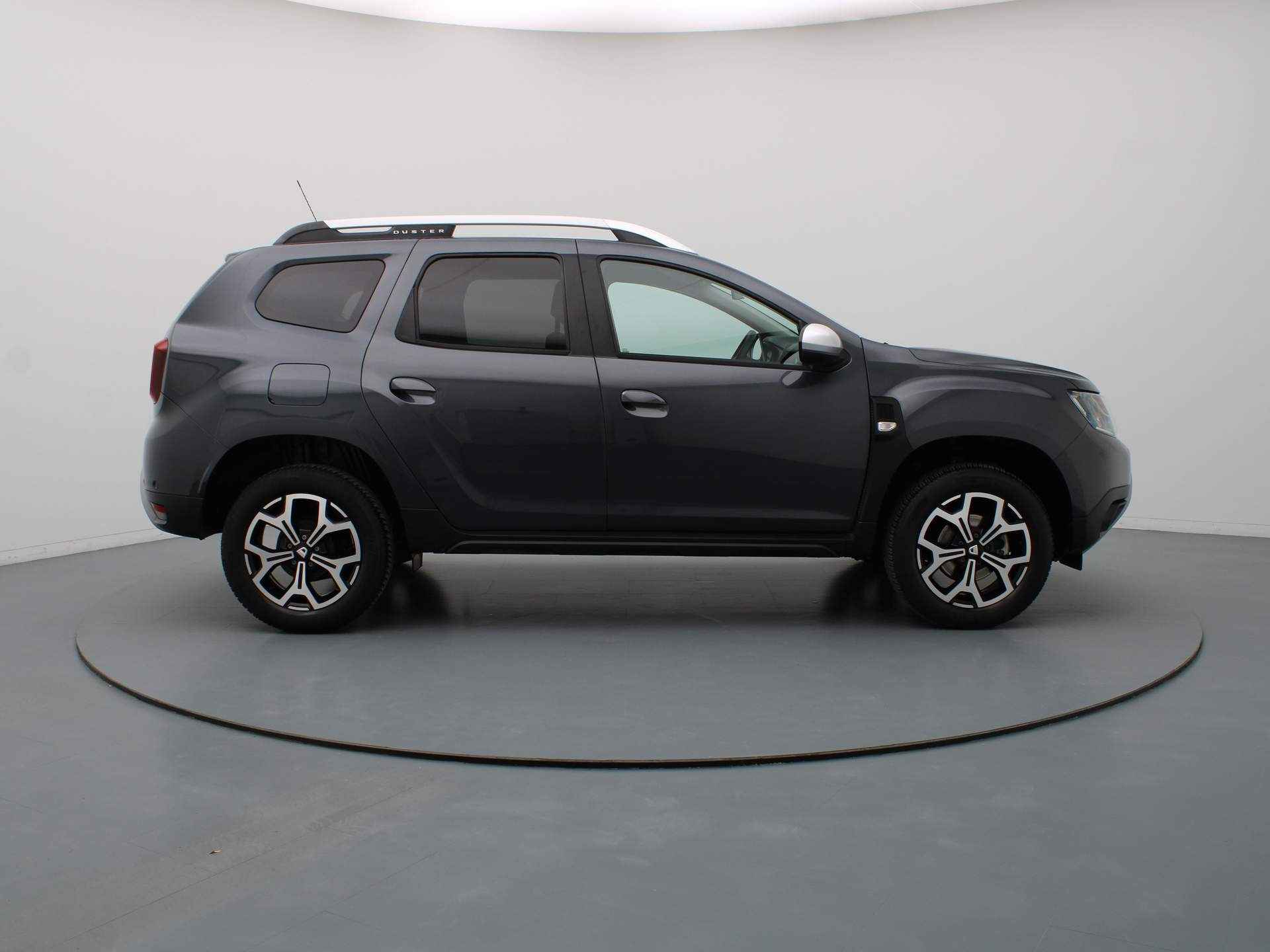 Dacia Duster TCe 100pk Bi-Fuel Prestige Airco | Camera | Navi | Parksens. achter - 24/35