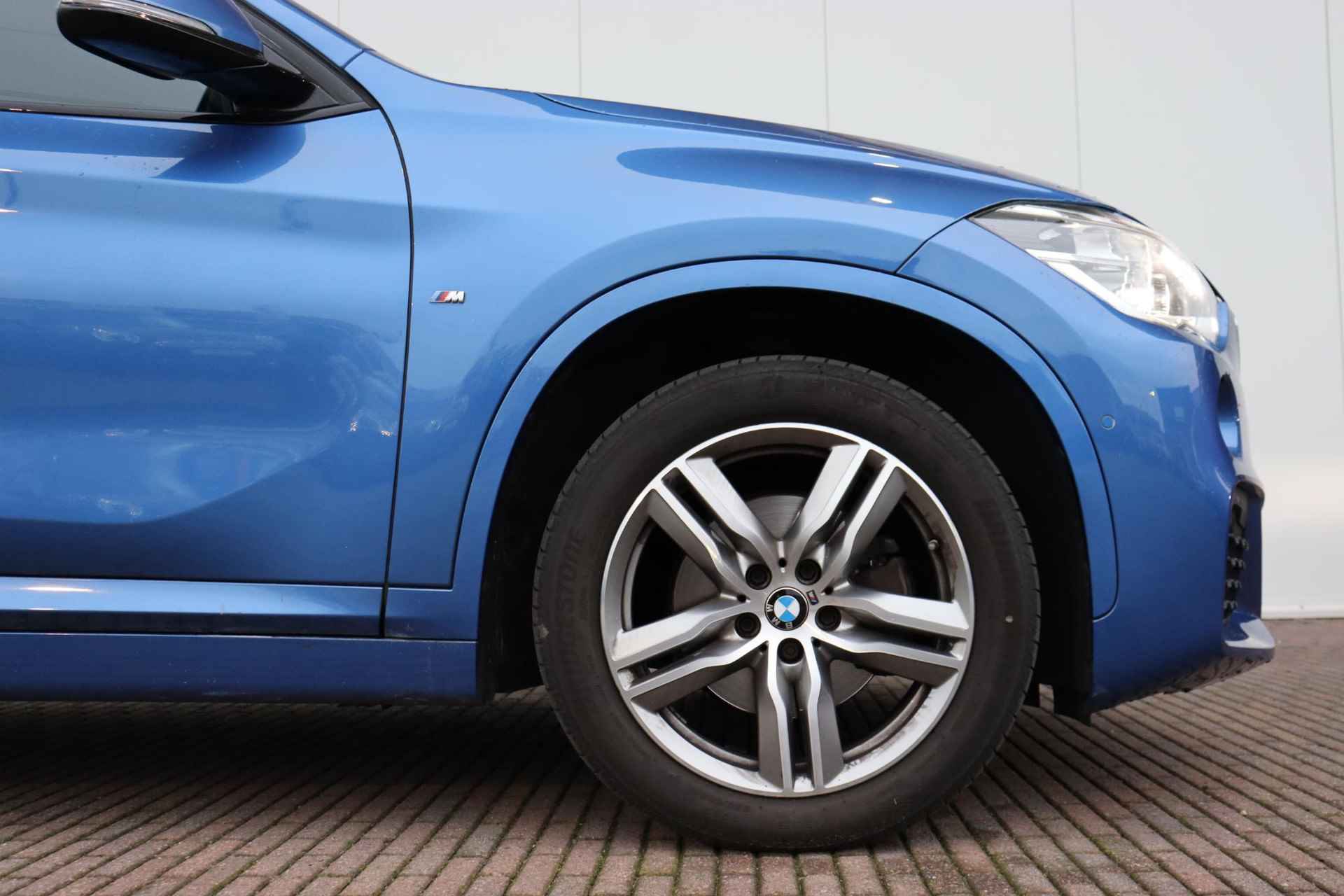 BMW X1 sDrive18i High Executive M-Sportpakket / Stoelverwarming / Achteruitrij camera / Electronic damping control - 5/33