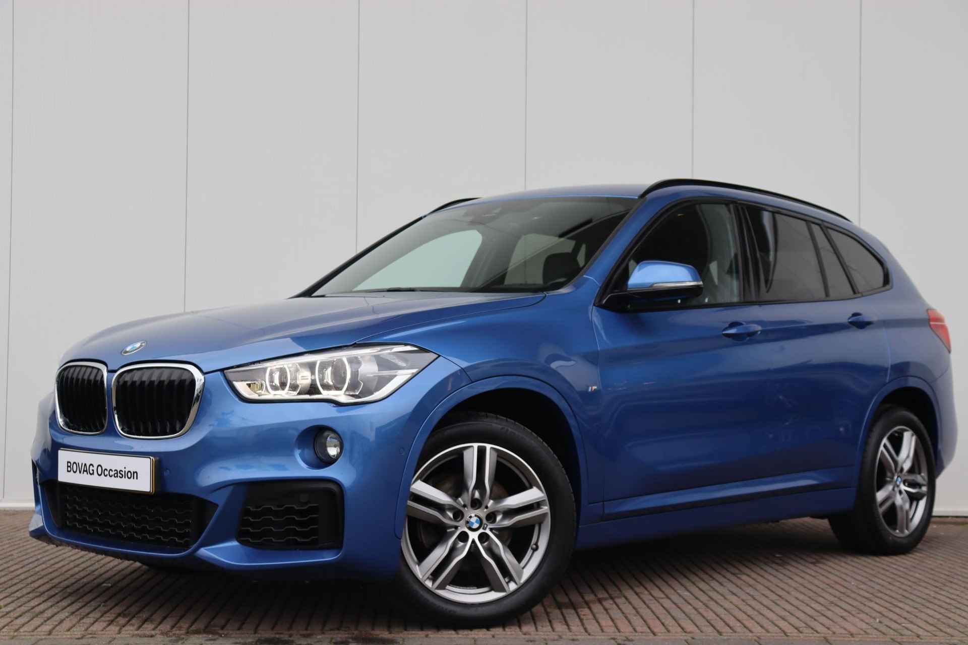 BMW X1 sDrive18i High Executive M-Sportpakket / Stoelverwarming / Achteruitrij camera / Electronic damping control - 33/33