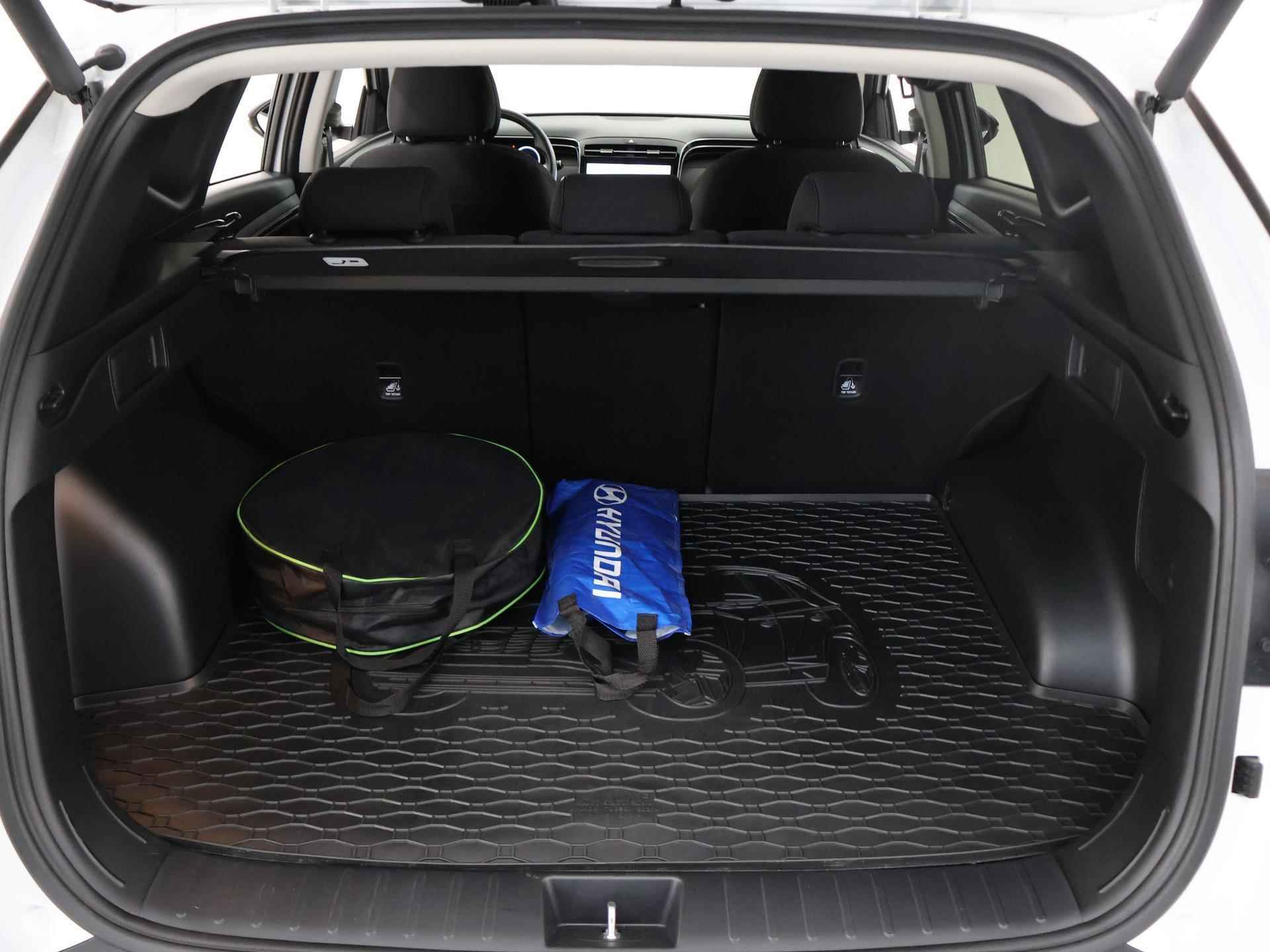 Hyundai Tucson 1.6 T-GDI PHEV Comfort Smart 4WD | Afneembare trekhaak | Adaptive Cruise Control | Stoel&Stuurverwarming | Navigatie | Parkeercamera | Climate Control | Lederen stuurwiel | Dodehoekdetectie | - 34/40
