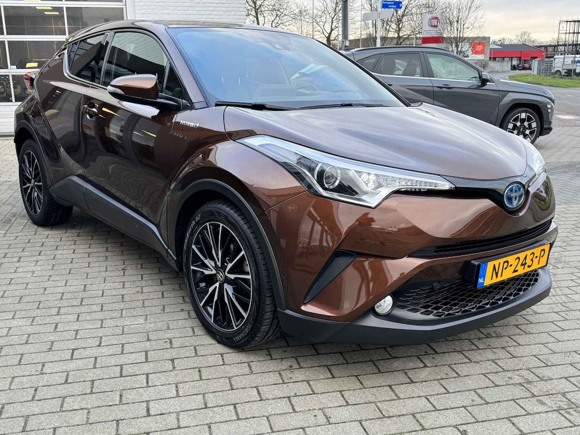 Toyota C-HR 1.8 Hybrid Executive | Dealer onderhouden | 1e eigenaar | Naviga - 7/30