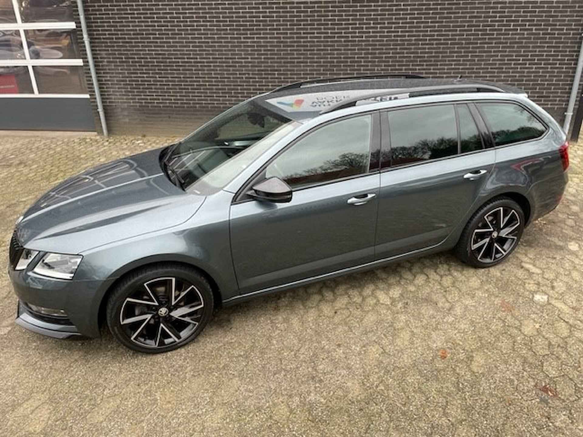 Skoda Octavia Combi 1.6 TDI Greentech 115pk Automaat - Trekhaak - 27/29