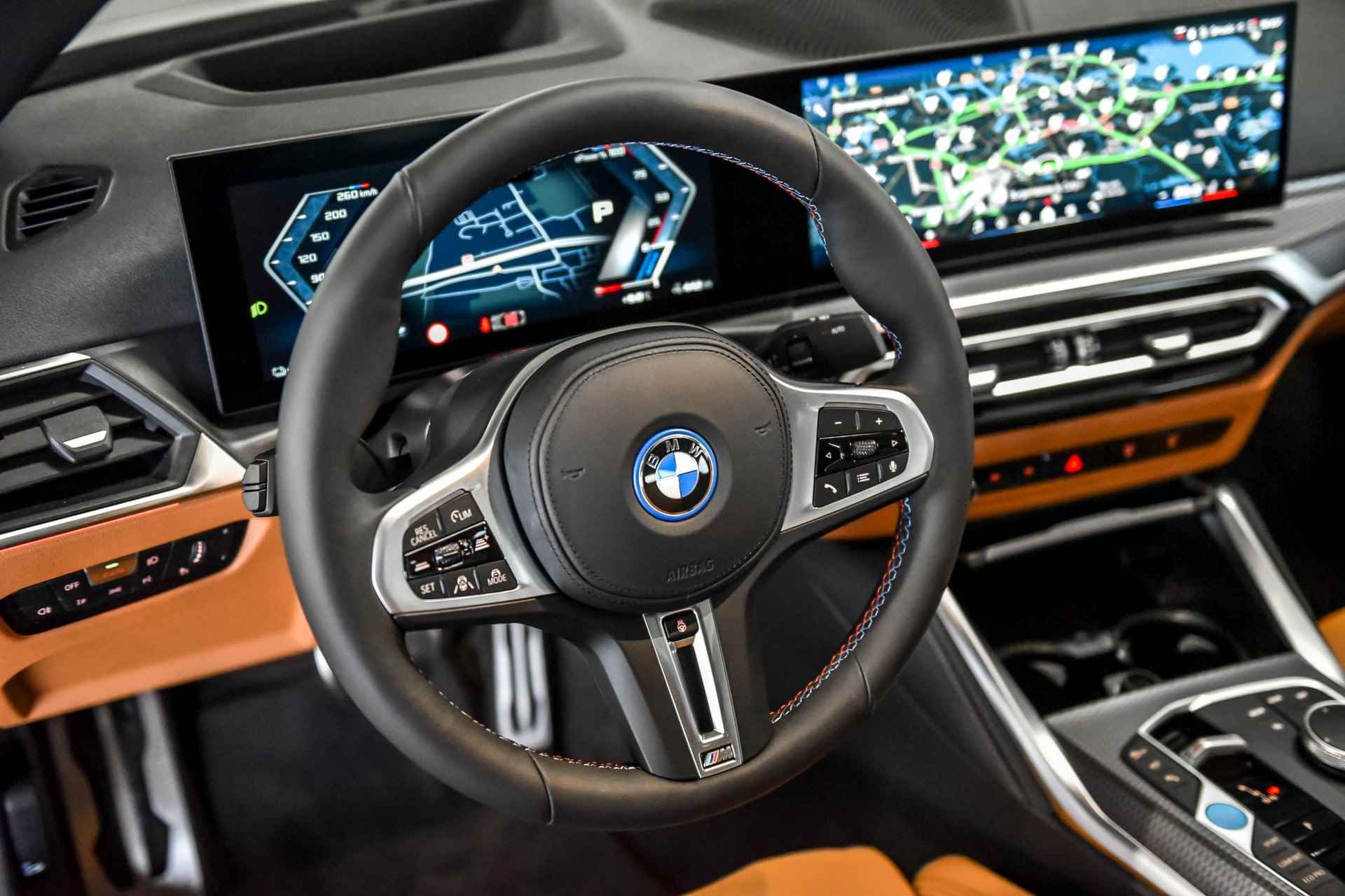 BMW i4 M50 High Executive 84 kWh | Elektrisch verstelbare stoelen | BMW Laserlight - 16/23