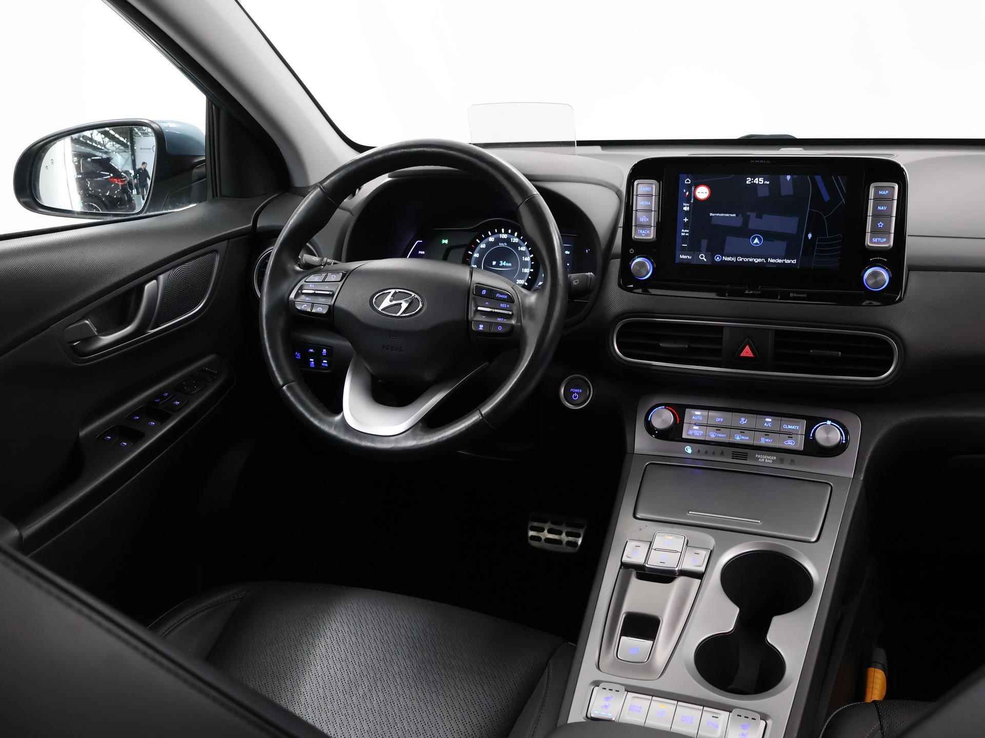 Hyundai Kona EV Premium 64 kWh | Schuif/Kantel dak | Navigatie | Camera | Stoelverwarming/Koeling | HUD | Lederen bekleding | Ele. verstelbare stoelen | Apple CarPlay | Krell Audio | - 10/48