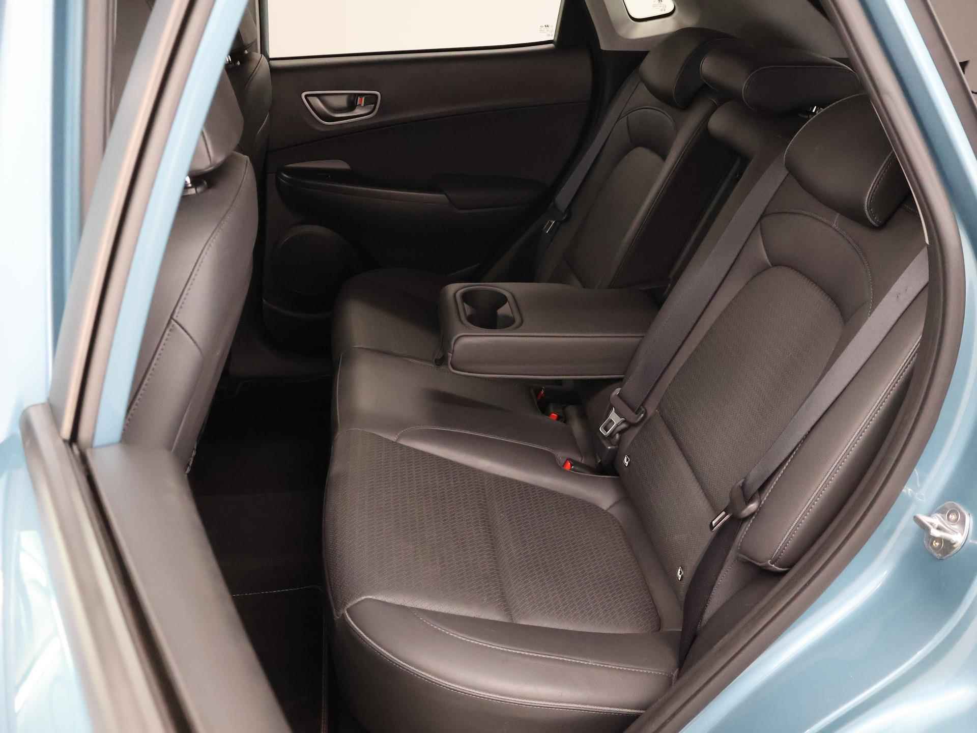 Hyundai Kona EV Premium 64 kWh | Schuif/Kantel dak | Navigatie | Camera | Stoelverwarming/Koeling | HUD | Lederen bekleding | Ele. verstelbare stoelen | Apple CarPlay | Krell Audio | - 12/48