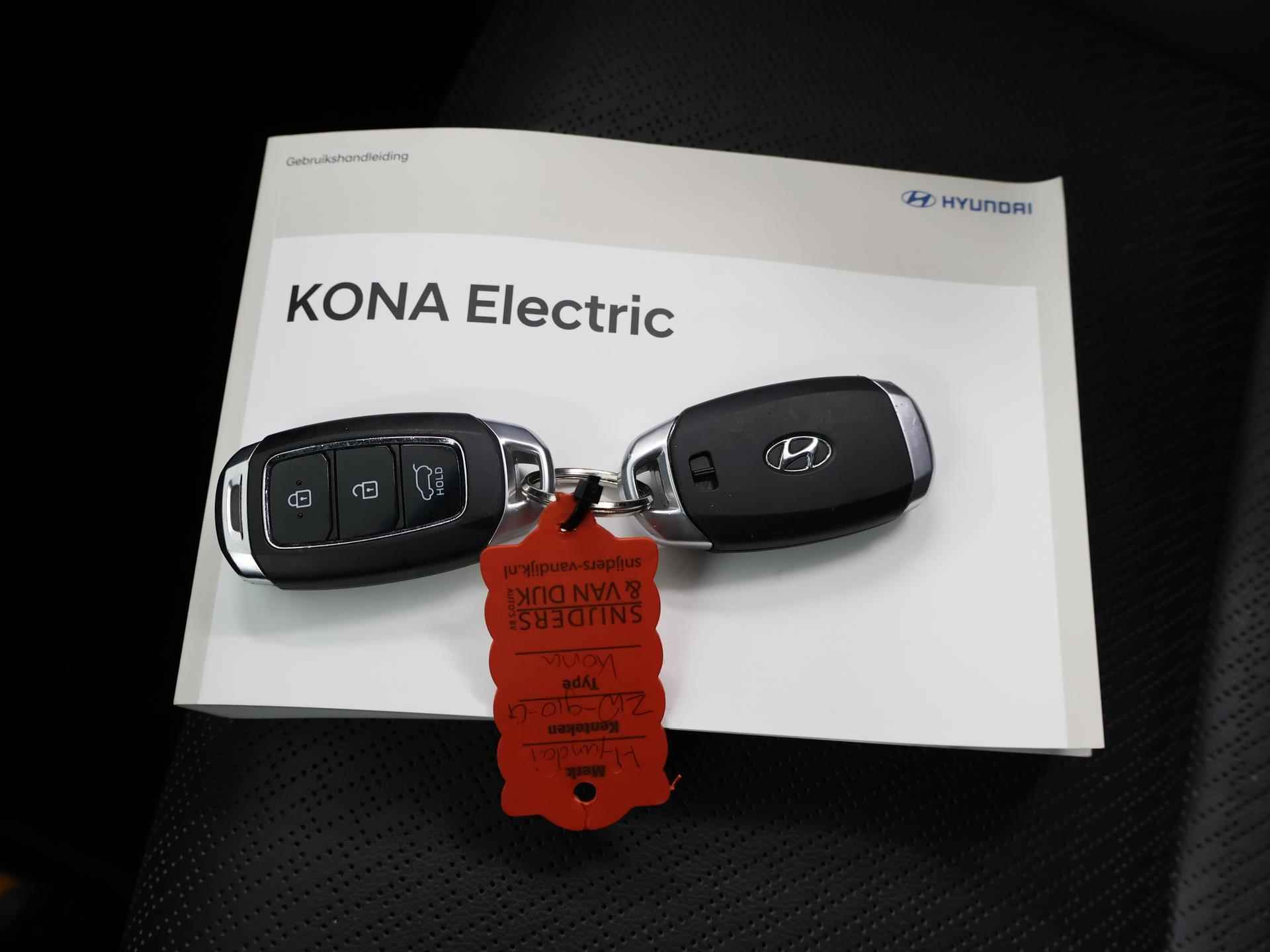 Hyundai Kona EV Premium 64 kWh | Schuif/Kantel dak | Navigatie | Camera | Stoelverwarming/Koeling | HUD | Lederen bekleding | Ele. verstelbare stoelen | Apple CarPlay | Krell Audio | - 32/48