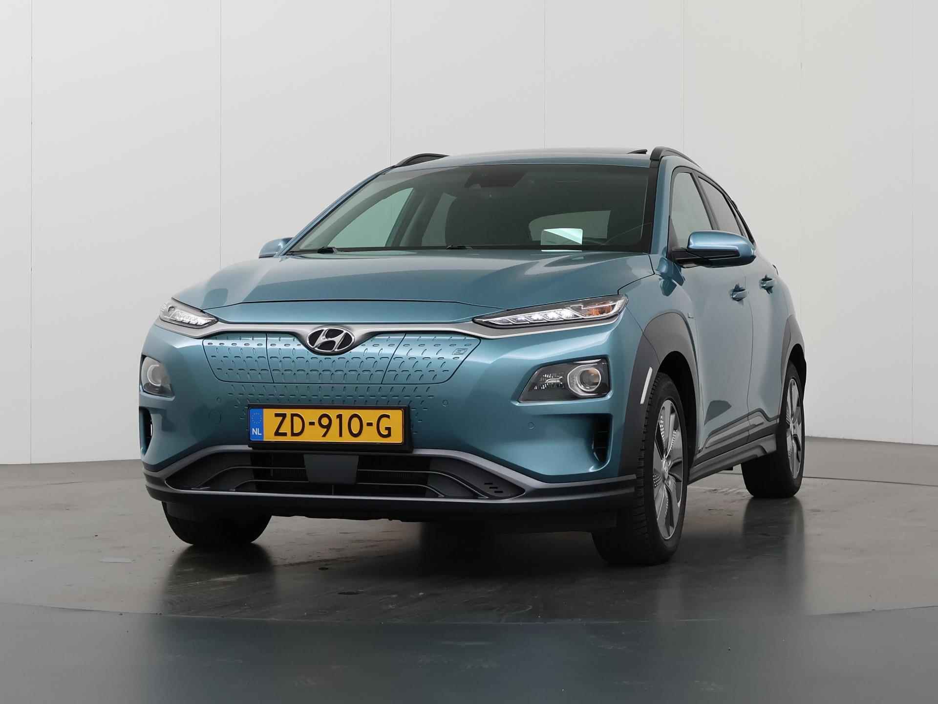 Hyundai Kona EV Premium 64 kWh | Schuif/Kantel dak | Navigatie | Camera | Stoelverwarming/Koeling | HUD | Lederen bekleding | Ele. verstelbare stoelen | Apple CarPlay | Krell Audio | - 48/48