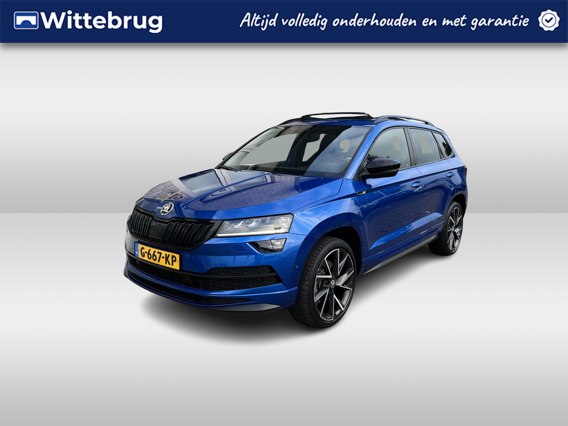 Škoda Karoq 1.5 TSI ACT Sportline Business / AUTOMAAT/ TREKHAAK/ PANO/ DCC/ CANTON AUDIO/ CAMERA/ PARK. SENSOREN/ LED/ DODE HOEK/ KEYLESS/ VIRTUAL COCKPIT/ STOEL VERWARM./ ADAPT. CRUISE/ APP CONNECT/ NAVI/ CLIMA/ DAB/