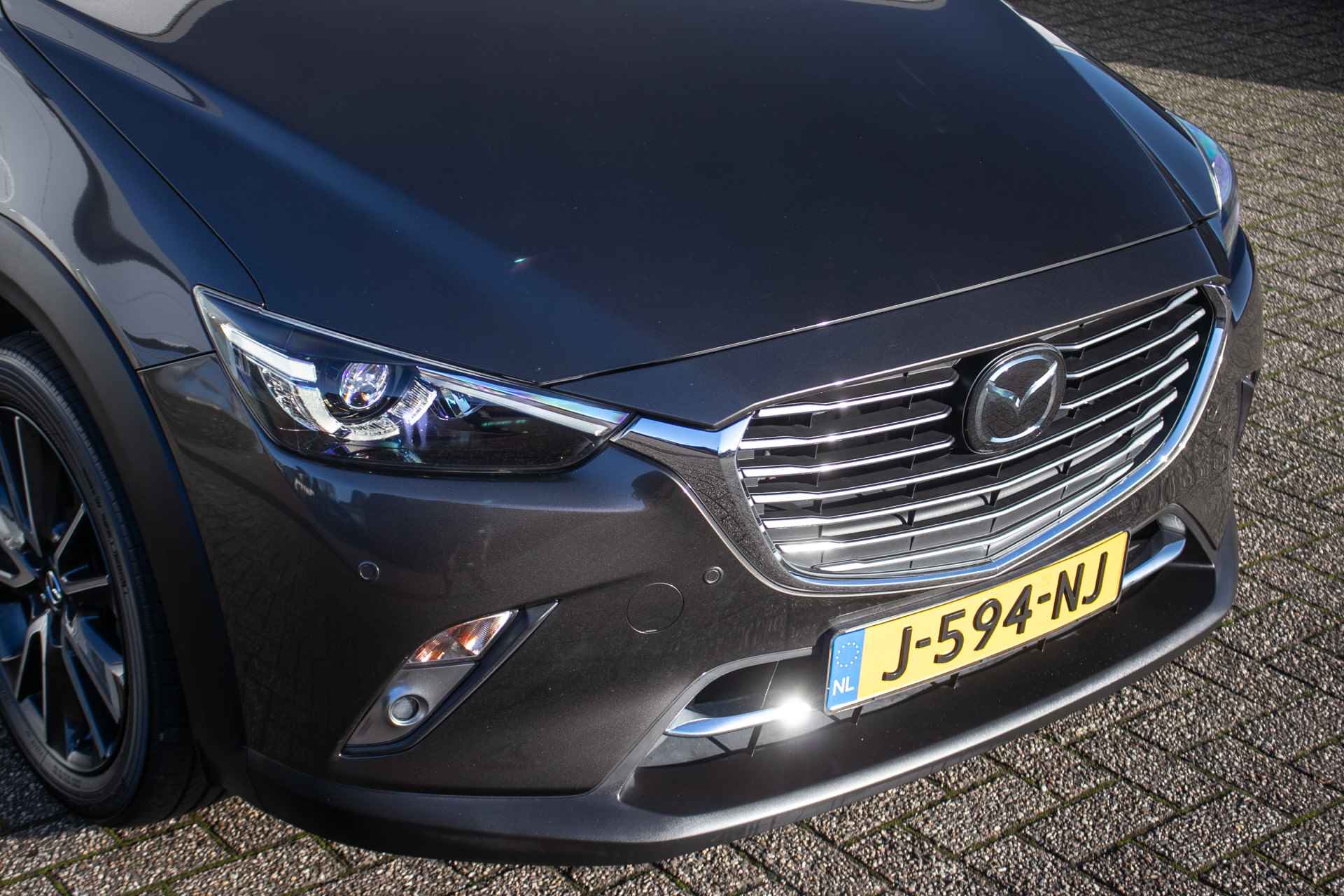 Mazda CX-3 2.0 SkyActiv-G 120 GT-M - All in rijklaarprijs | Navi | Blind spot | BOSE | Afn. trekhaak | Stoelverw. - 27/44