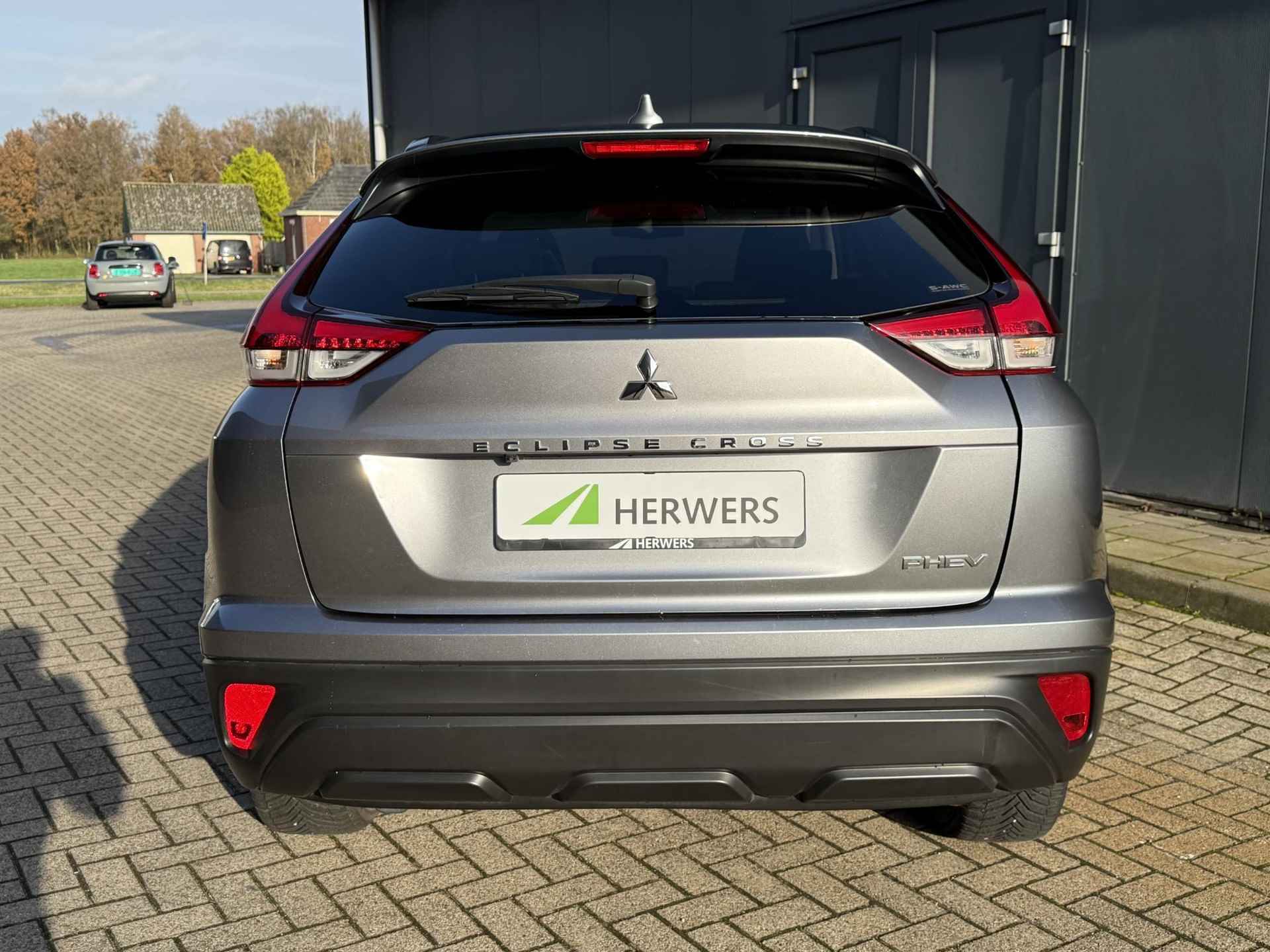 Mitsubishi Eclipse Cross 2.4 PHEV Intense S-AWC 4WD Automaat / Camera / Climate Control / Cruise Control / Keyless Entry&Go / Android & Apple Carplay / Stoelverwarming / DAB / All-Season banden - 34/35