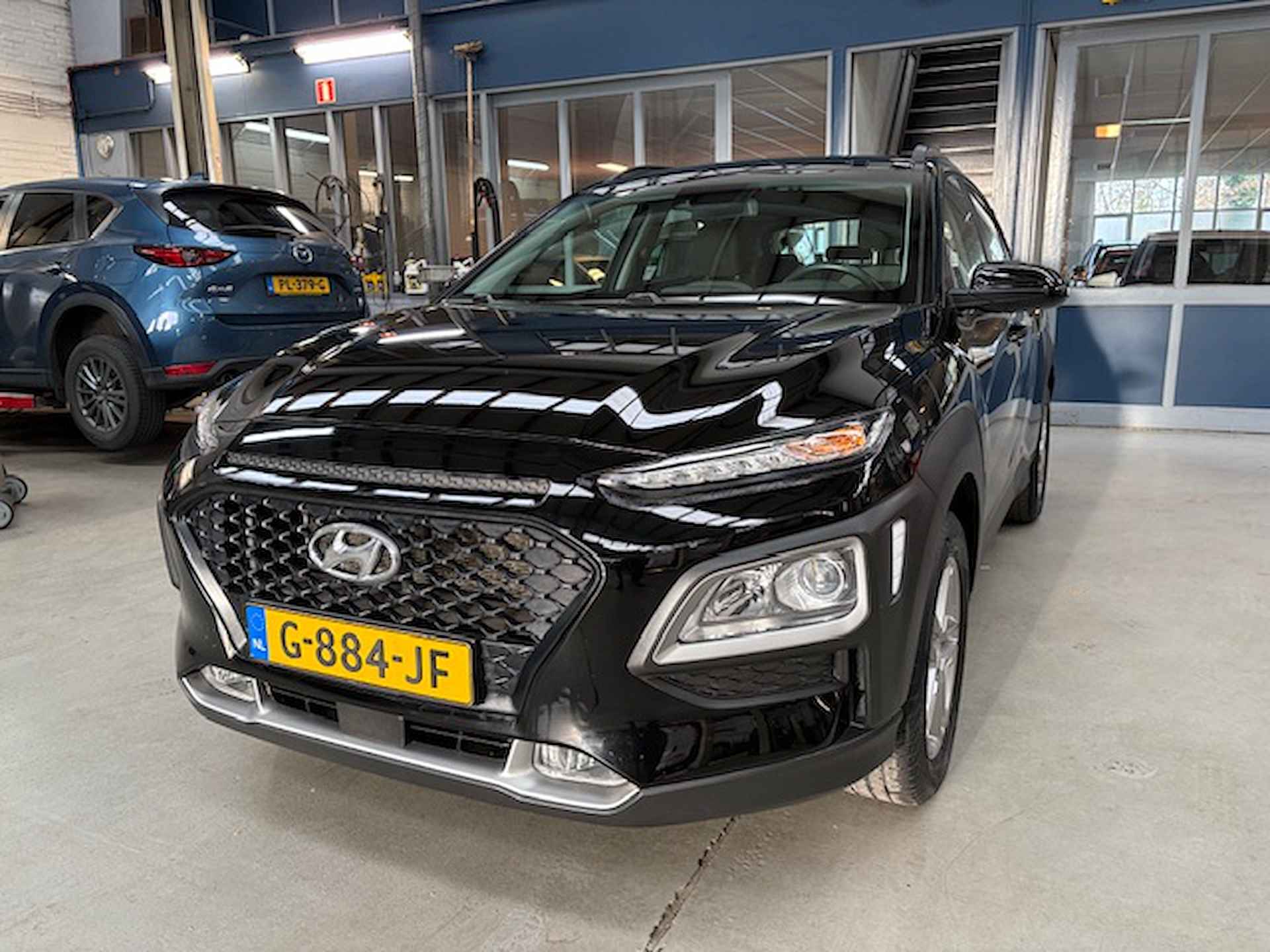 Hyundai Kona 1.0 T-GDI 120pk Comfort | Navigatie | Apple carplay / Android auto | Trekhaak | Camera | Cruise control | All-season banden | NAP | Rijklaar prijs! - 3/24