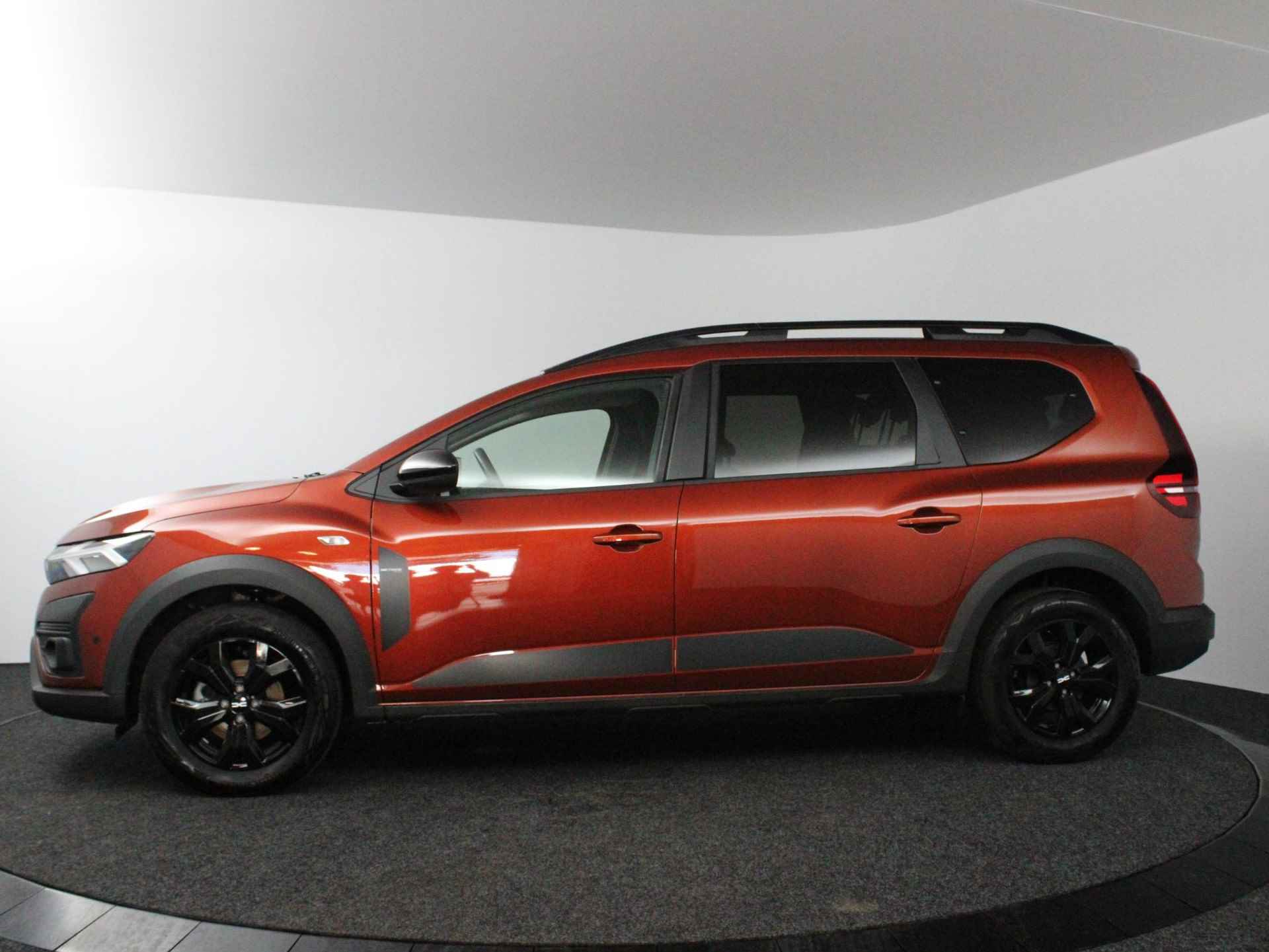 Dacia Jogger 1.0 TCe 100 ECO-G Extreme 7p. | 1e eigenaar + dealer onderhouden! | Trekhaak afn. | JBL | Navi | Clima | Cruise | Stoelverw. | PDC V+A + Camera | Apple Carplay/Android Auto - 9/30