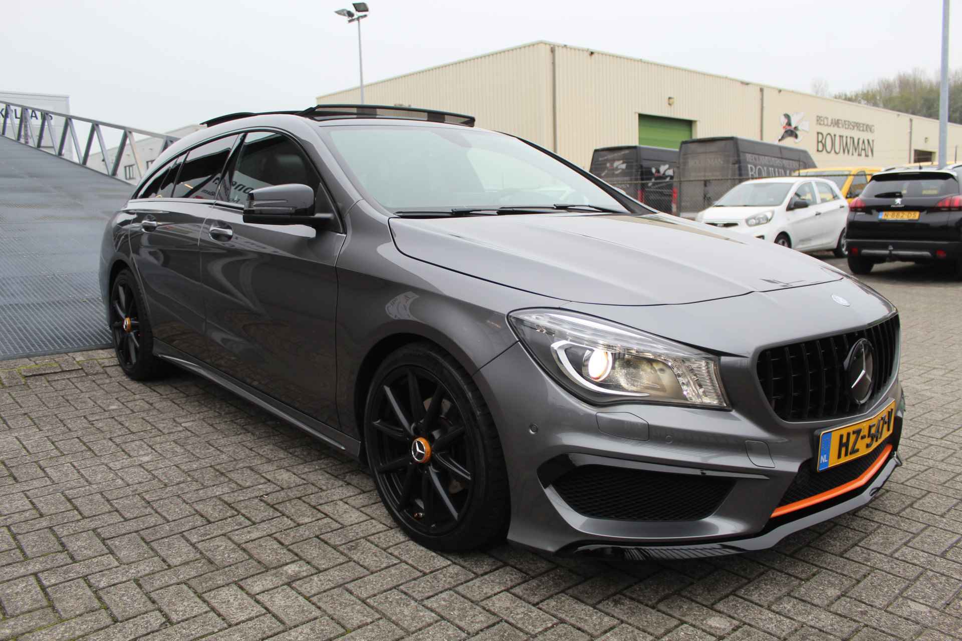 Mercedes-Benz CLA-Klasse Shooting Brake 180 OrangeArt Edition Automaat AMG pakket Panoramadak/Achteruitrijcamera/Navigatie/StoelVerwarming/Cruise control - 10/30