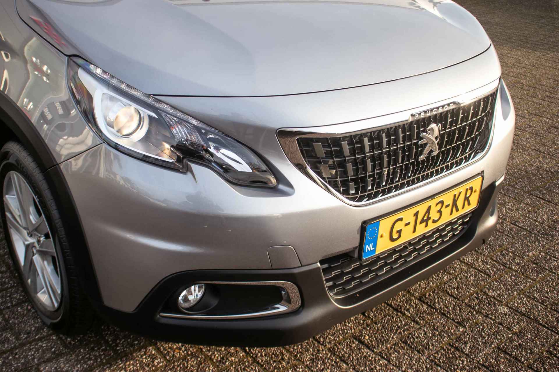 Peugeot 2008 1.2 PureTech Signature All-in rijklaarprijs | Dealerond. | Trekhaak | Nav | Cruise - 27/37