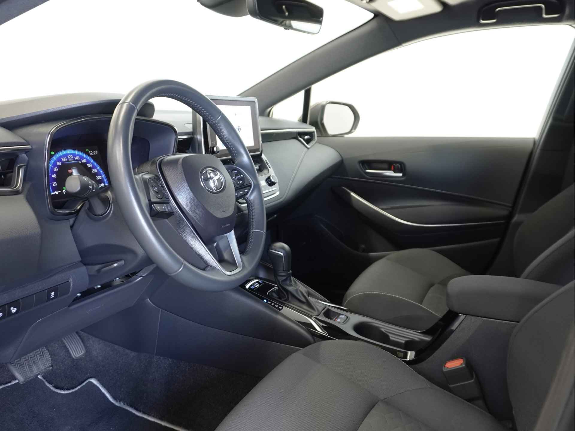 Toyota Corolla Touring Sports 1.8 Hybrid Business Plus | Navi | Keyless | Stoelverwarming | PDC v+a | Rijklaarprijs - 18/49