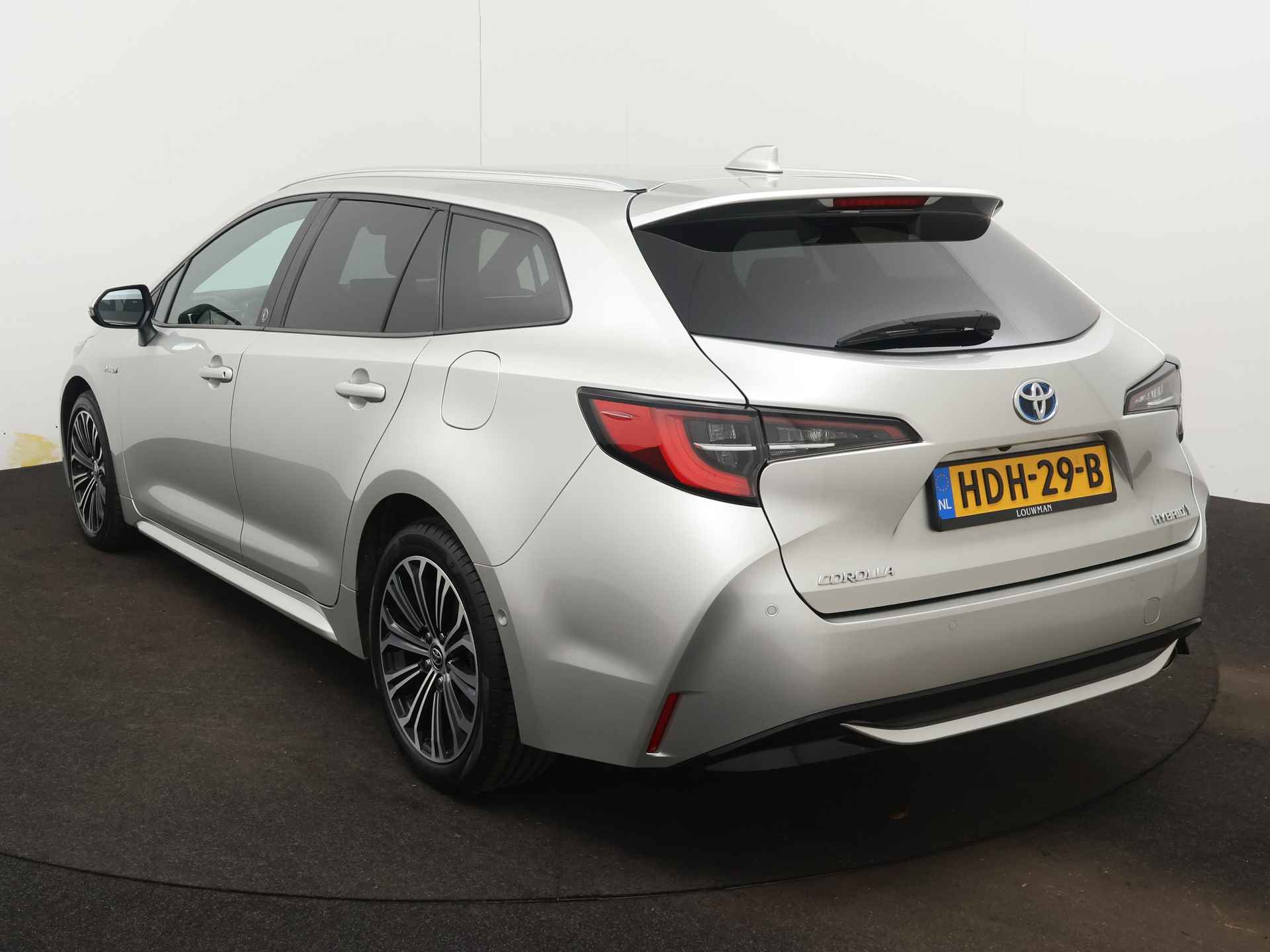 Toyota Corolla Touring Sports 2.0 Hybrid Touring Sports Style Limited | Dodehoek Ass | Stoel en stuurwiel verwarmd | LM velgen | Navigatie | Camera | Climate Control | Parkeersensoren | - 17/49