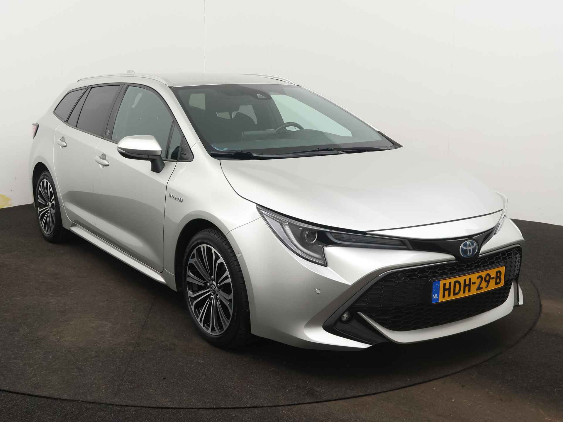 Toyota Corolla Touring Sports 2.0 Hybrid Touring Sports Style Limited | Dodehoek Ass | Stoel en stuurwiel verwarmd | LM velgen | Navigatie | Camera | Climate Control | Parkeersensoren | - 29/49