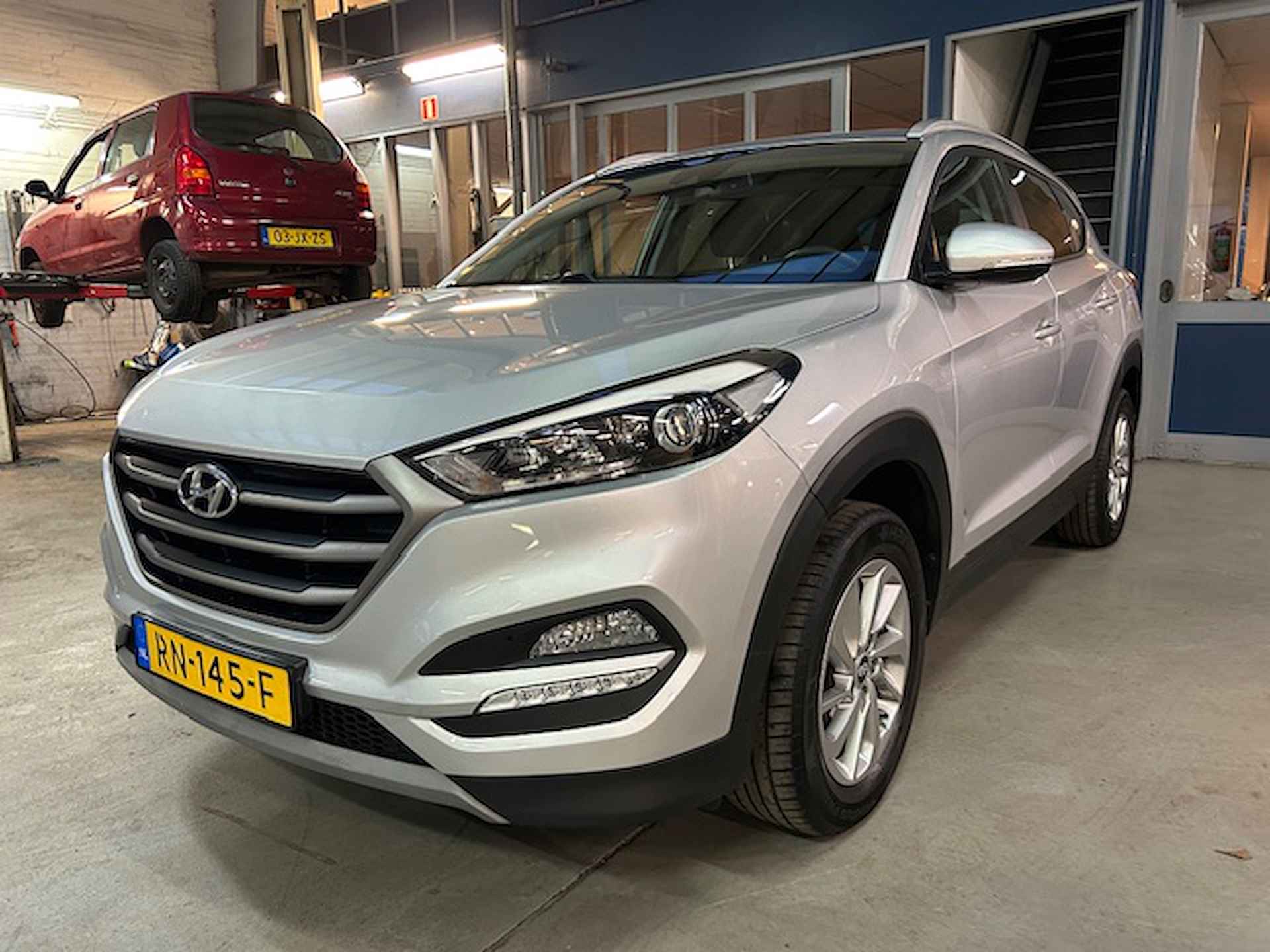 Hyundai Tucson 1.6 GDi 132pk Anniversary Edition | Trekhaak | Navigatie | Camera | Climate control | LED | Stoelverwarming | Cruise control | NAP | Rijklaar prijs! - 4/25