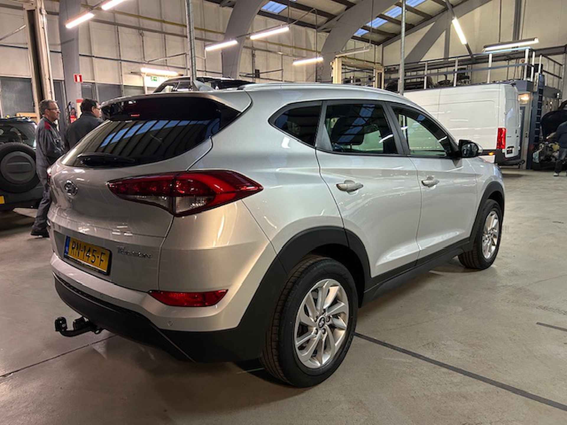 Hyundai Tucson 1.6 GDi 132pk Anniversary Edition | Trekhaak | Navigatie | Camera | Climate control | LED | Stoelverwarming | Cruise control | NAP | Rijklaar prijs! - 7/25