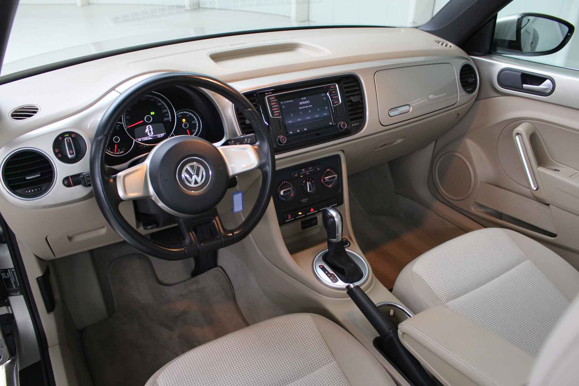 Volkswagen Beetle Cabriolet 1.2 TSI DSG BlueMotion Navigatie | Stoelverwarming | Cruise Control | - 10/25