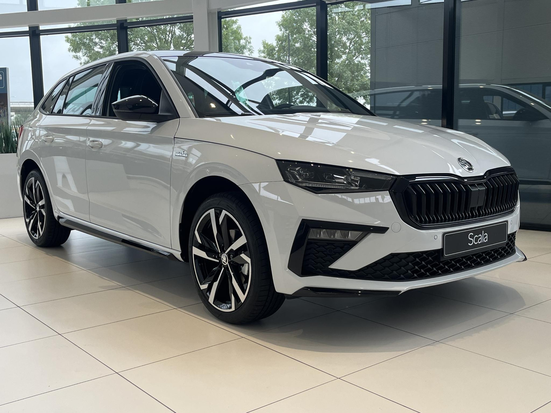 Skoda Scala 1.0 TSI Monte Carlo 115 PK | Automaat | Matrix LED Koplampen | Navigatie | Climate Control | Achteruitrijcamera | Panorama dak | Lederen bekleding | Keyless-Entry | Adaptive Cruise Control | Privacy Glass | Apple Carplay/Android Auto | Parkeersensoren | Stoelverwarming | Lichtmetalen velgen | € 1.500,- inruilpremie! | Direct leverbaar! |