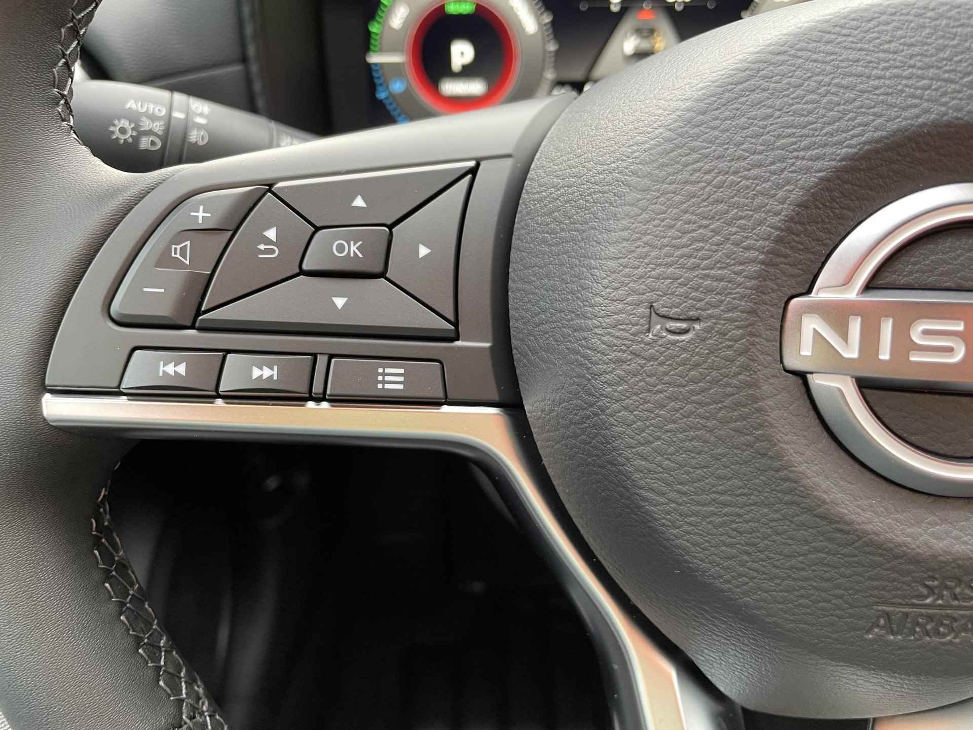 Nissan Juke 1.6 Hybrid Tekna / Bose Premium Audio / Navigatie / 19" Lichtmetalen velgen / Adaptieve Cruise Control - 31/37