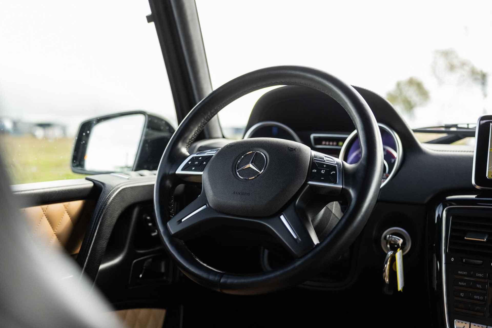 Mercedes-Benz G-klasse AMG 65 | V12 | UNIEK! | Designo | Adaptieve cruise control | Panoramadak | Stoelverwarming en verkoeling | Nieuwprijs €407.000,- | - 29/74