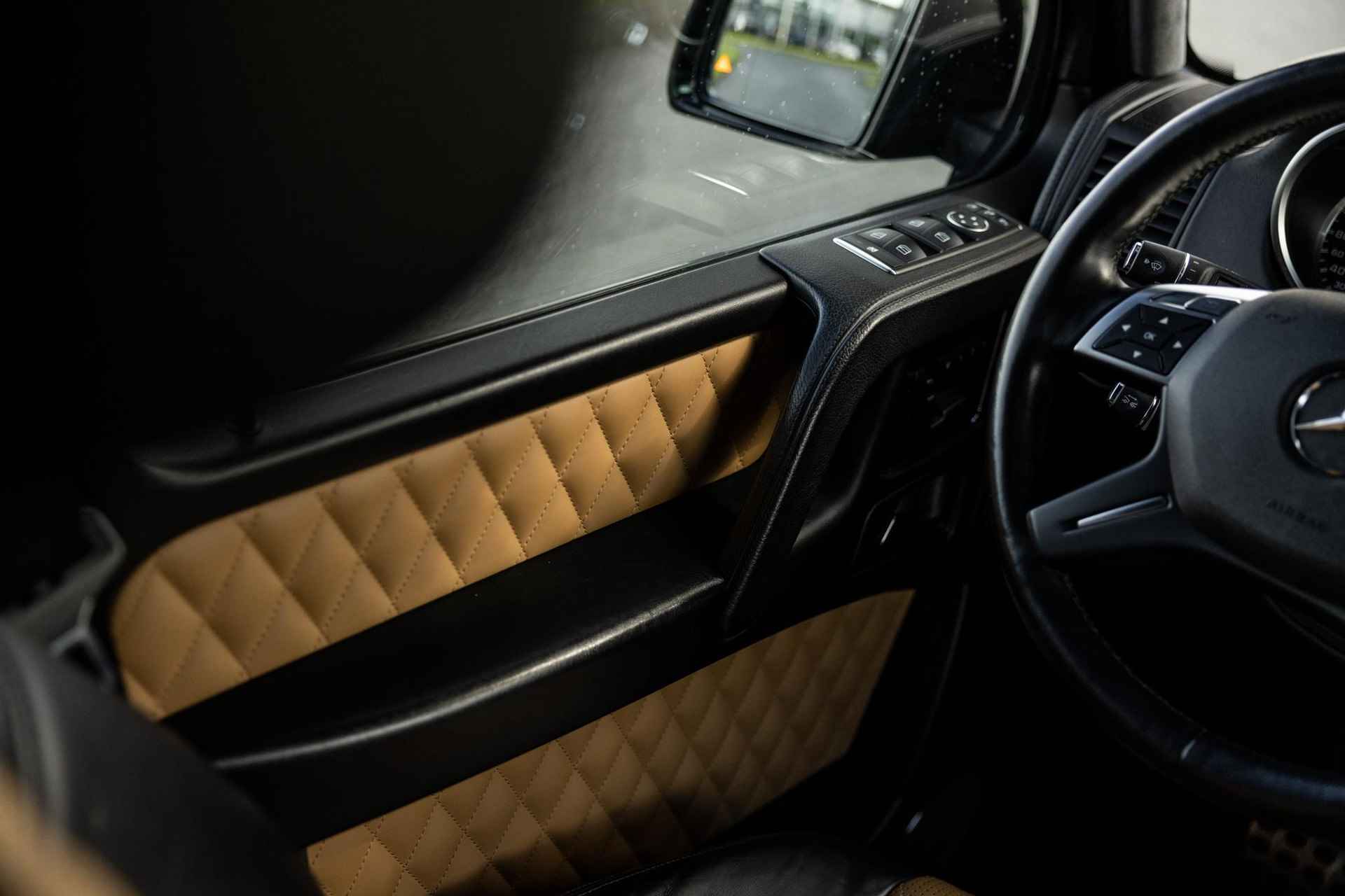 Mercedes-Benz G-klasse AMG 65 | V12 | UNIEK! | Designo | Adaptieve cruise control | Panoramadak | Stoelverwarming en verkoeling | Nieuwprijs €407.000,- | - 30/74