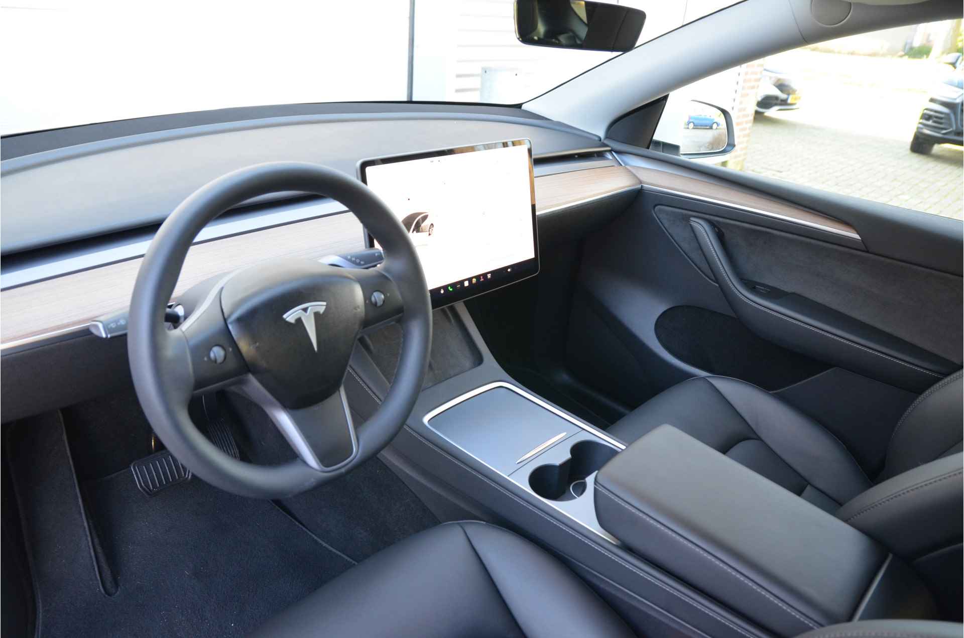 Tesla Model Y RWD 58 kWh AutoPilot, Warmtepomp, LFP accu dus 100% Opladen - 10/34