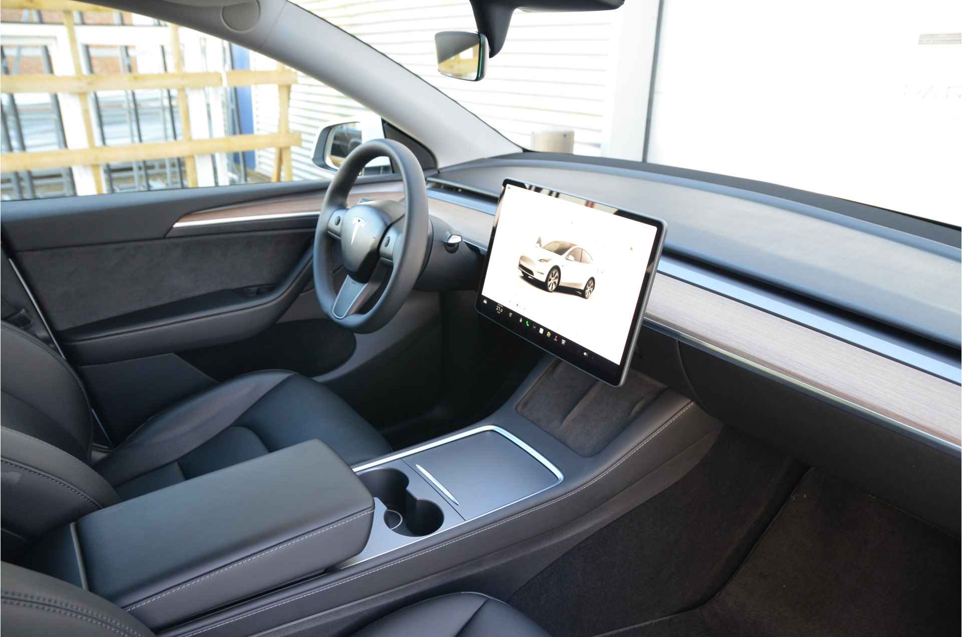 Tesla Model Y RWD 58 kWh AutoPilot, Warmtepomp, LFP accu dus 100% Opladen - 11/34