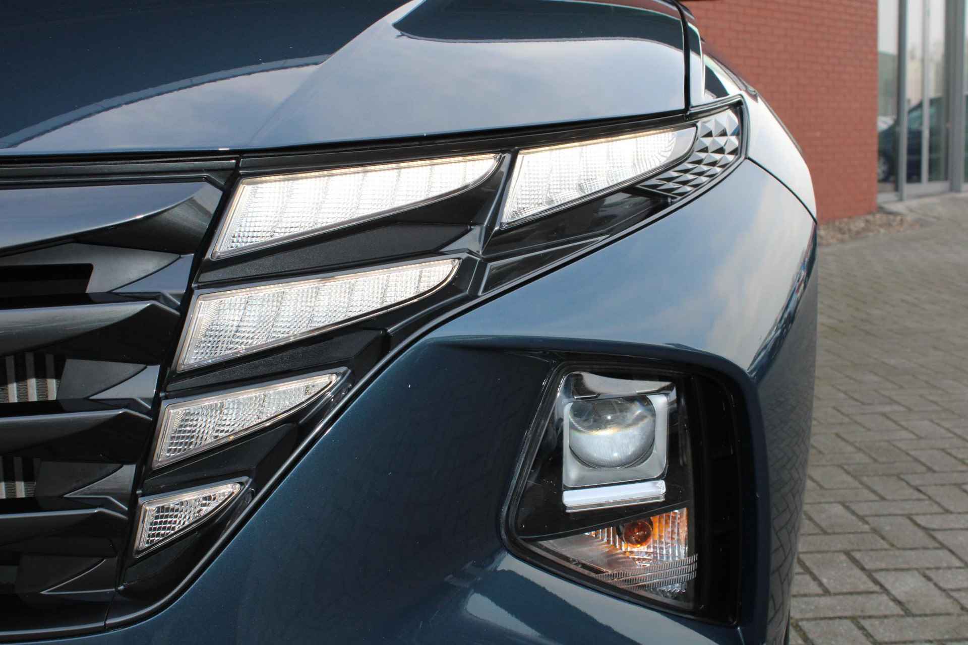 Hyundai Tucson 1.6 T-GDI 150 PK Automaat MHEV i-Motion | Adaptieve Cruise Control | Climate Control | Apple Carplay | DAB | 18 Inch Lichtmetalen Velgen | Stoelverwarming | Stuurwielverwarming - 11/27