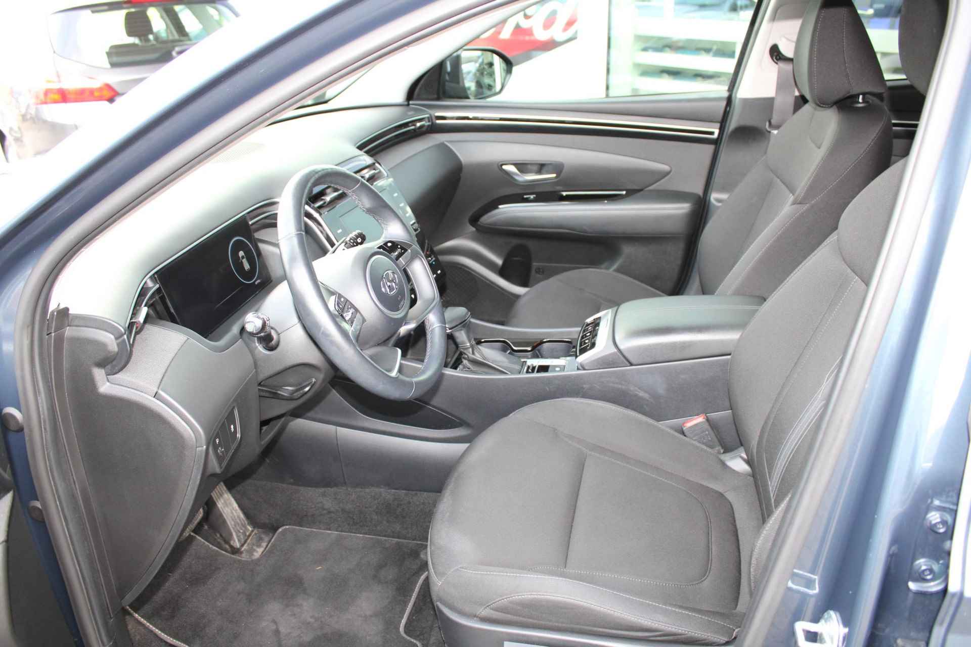 Hyundai Tucson 1.6 T-GDI 150 PK Automaat MHEV i-Motion | Adaptieve Cruise Control | Climate Control | Apple Carplay | DAB | 18 Inch Lichtmetalen Velgen | Stoelverwarming | Stuurwielverwarming - 14/27