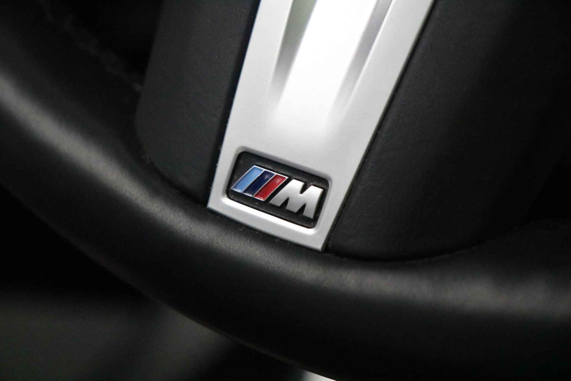 BMW X7 M50d High Executive Automaat / Panoramadak Sky Lounge / Trekhaak / Laserlicht / Active Steering / Stoelventilatie / Driving Assistant Professional / Soft Close / Harman Kardon - 23/30