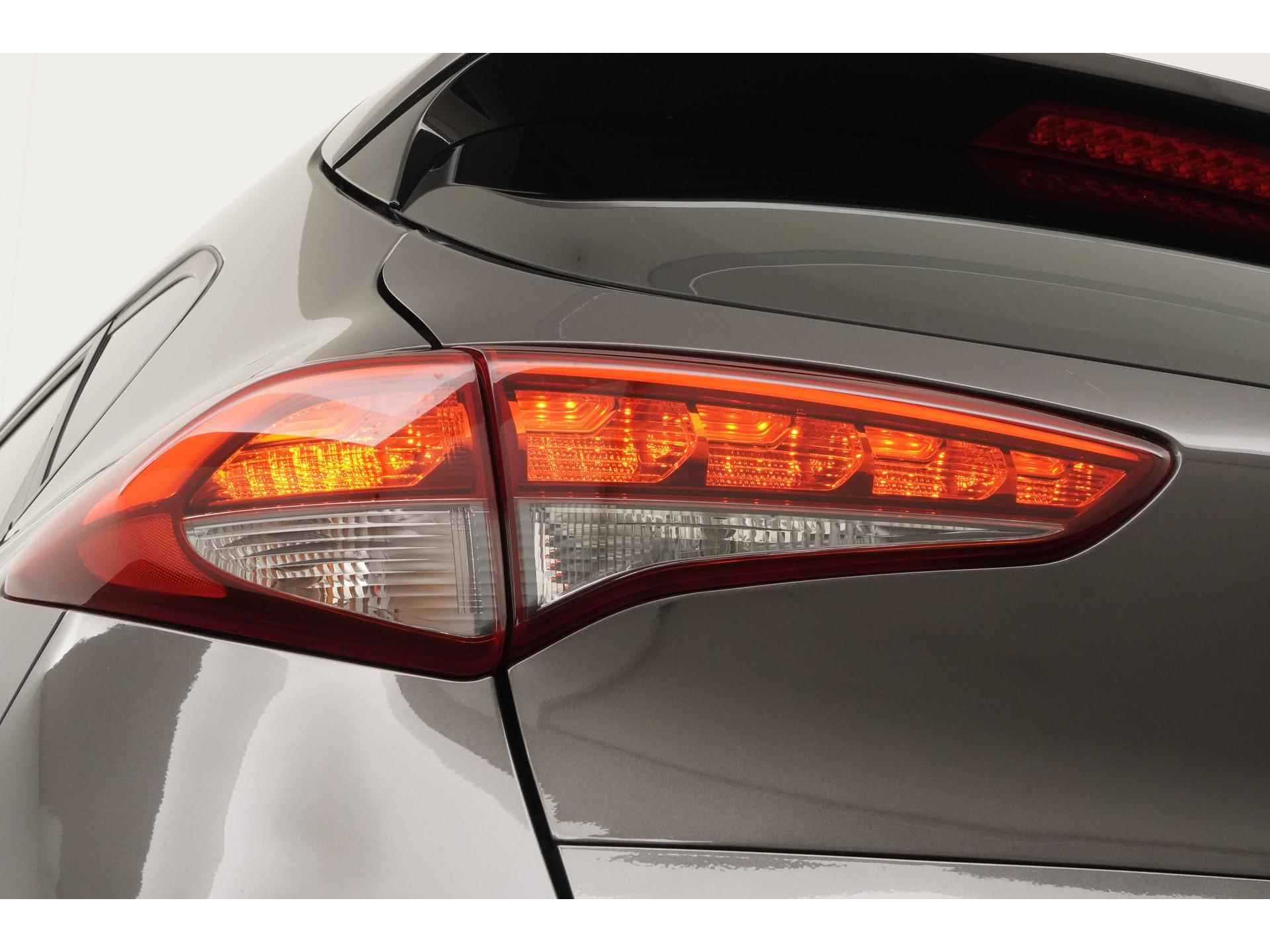 Hyundai Tucson 1.6 GDi Anniversary Edition | Trekhaak | Navigatie | Zondag Open! - 23/33