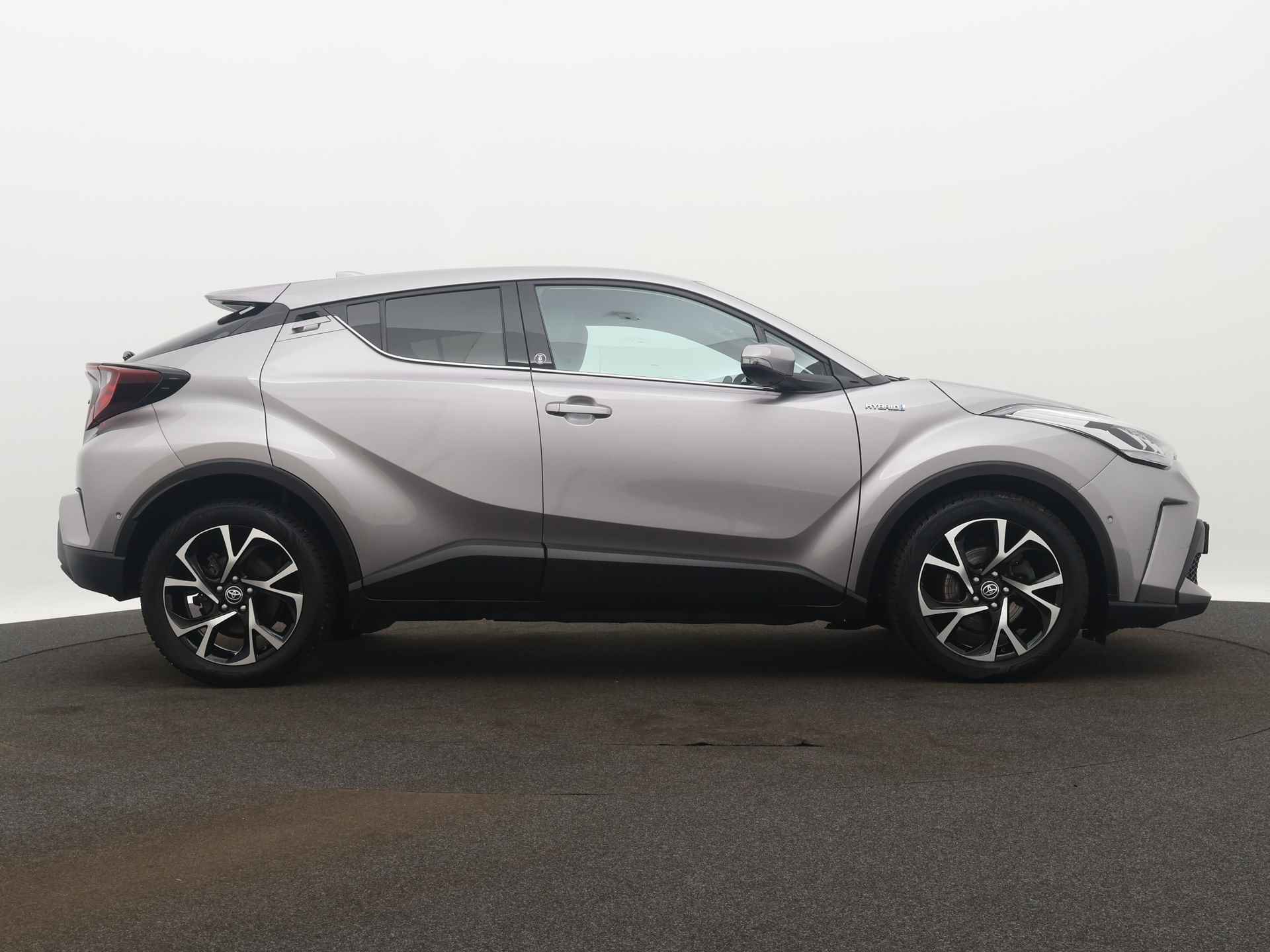 Toyota C-HR 1.8 Hybrid Dynamic+ Limited | Parkeersensoren | Stoel en stuurwiel verwarmd | LM velgen | Cruise Control Adaptief | Climate Control | Camera | - 16/45