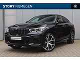 BMW X6 xDrive40i High Executive M Sport Automaat / Panoramadak / Trekhaak / Laserlight / Parking Assistant Plus / Soft Close / Active Steering / M Adaptief onderstel