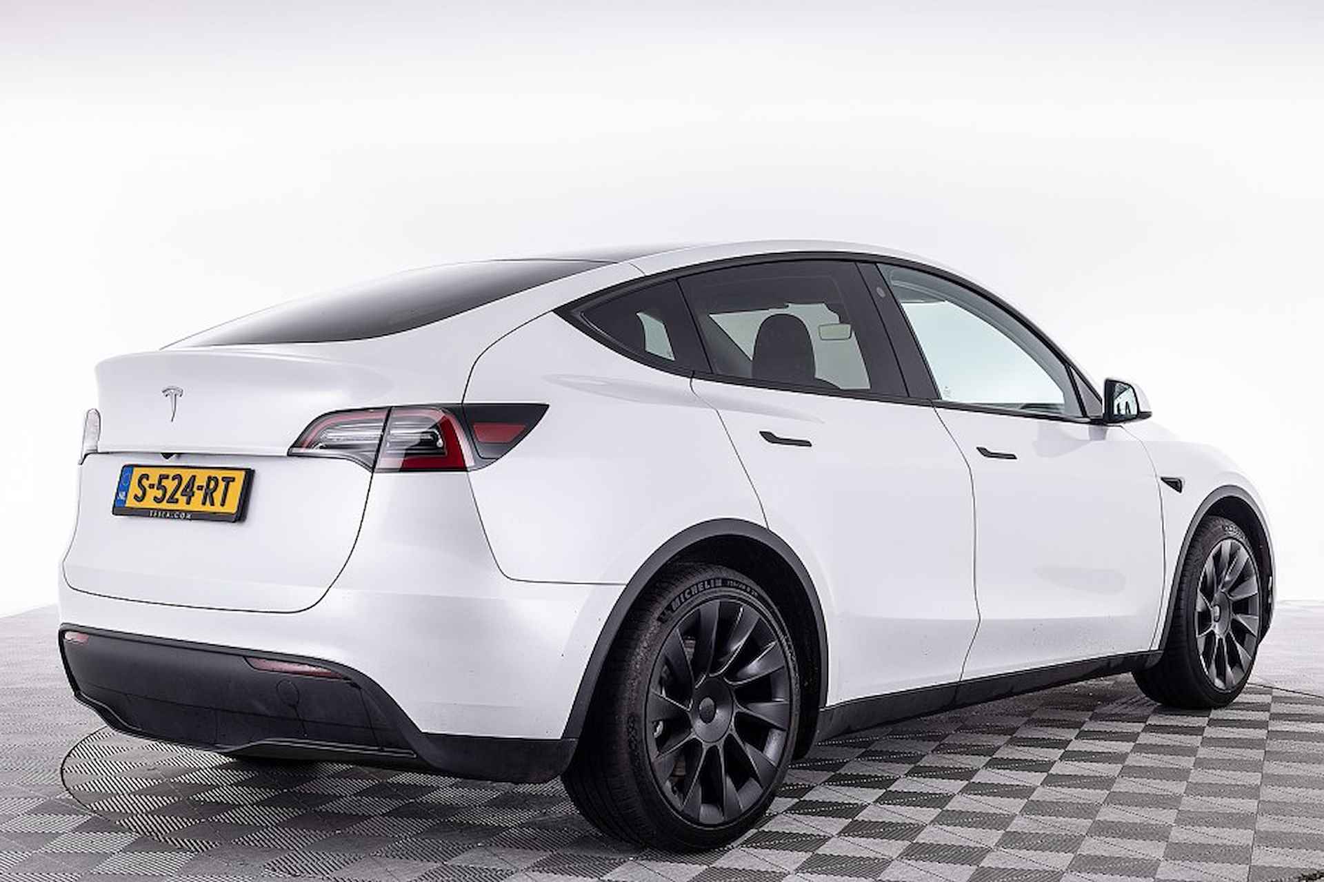 Tesla Model Y RWD 58 kWh | LEDER | PANORAMADAK ✅ 1e Eigenaar . - 20/25