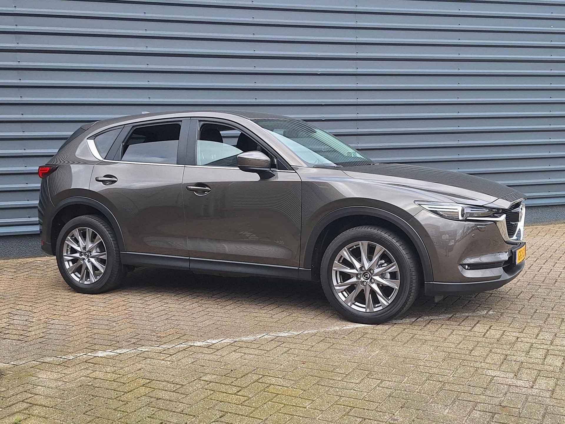 Mazda CX-5 2.5 SkyActiv-G 194 Comfort | Rijklaarprijs! | Climate Control | Navigatie | Cruise Control | HUD | Stoel-Stuurverwarming | Inclusief 36 mnd Garantie! | - 7/37