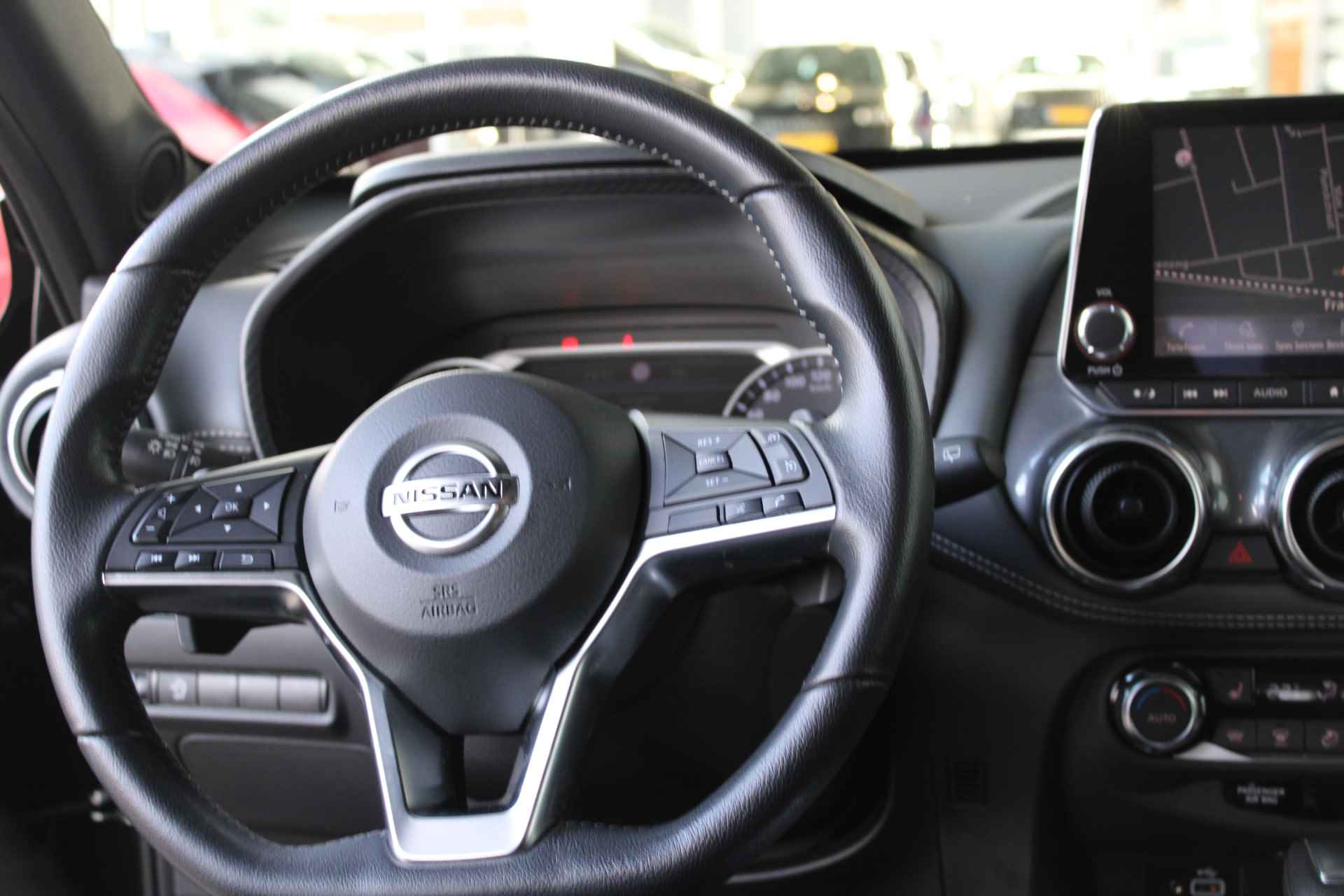 Nissan Juke 1.0 DIG-T Business Edition NAVI/CAMERA/KEYLESS/PDC/CLIMATE/STOELVERWARMING/VERWAMRDE VOORRUIT - 16/31