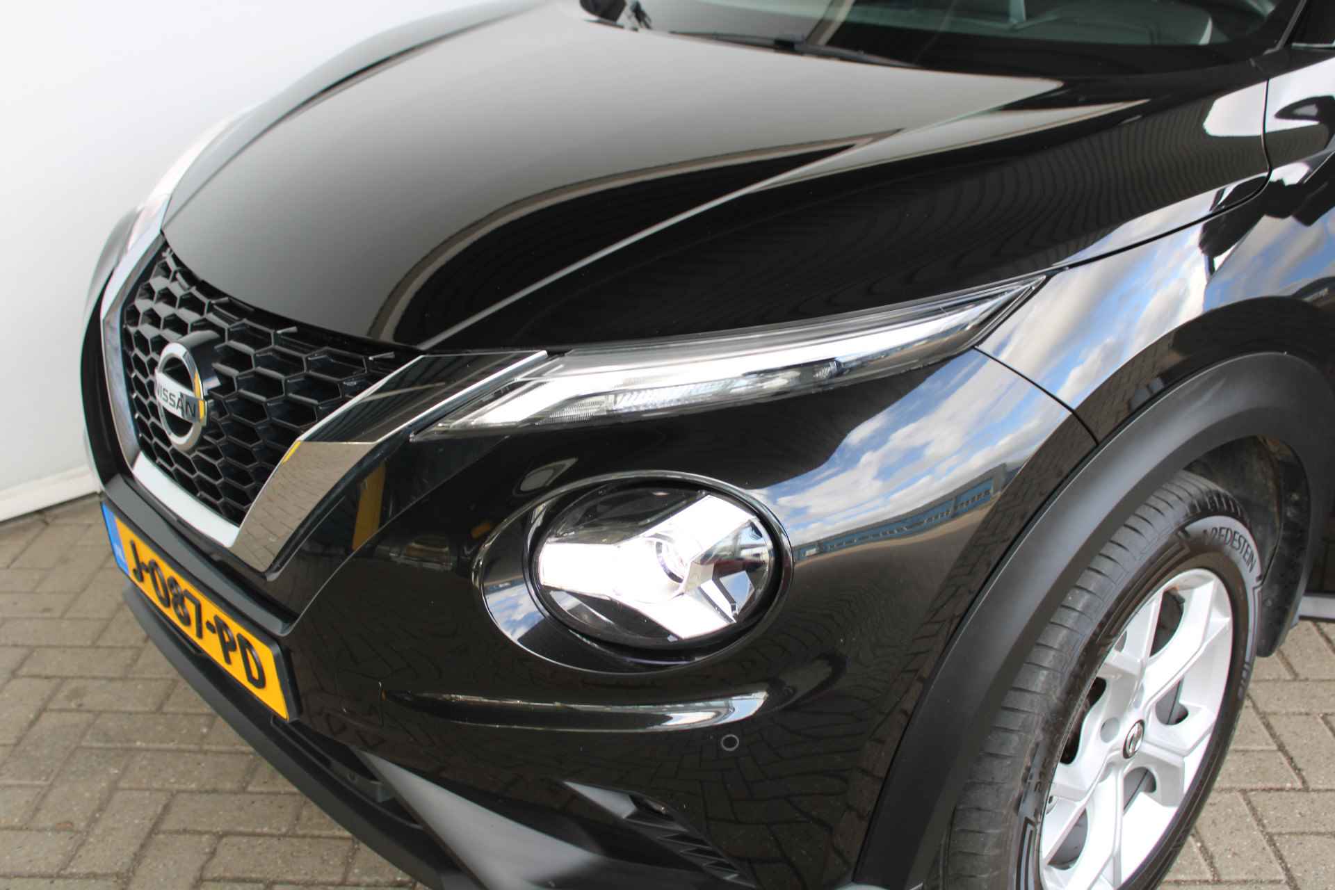 Nissan Juke 1.0 DIG-T Business Edition NAVI/CAMERA/KEYLESS/PDC/CLIMATE/STOELVERWARMING/VERWAMRDE VOORRUIT - 29/31