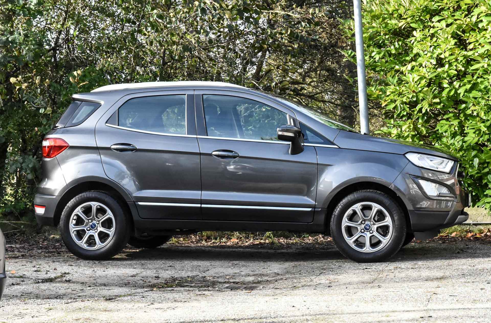 Ford EcoSport 1.0 EcoBoost Titanium automaat / verwarmd stuur / stoelverwarming / cruise control / navi / airco / half leer/half stof - 29/38