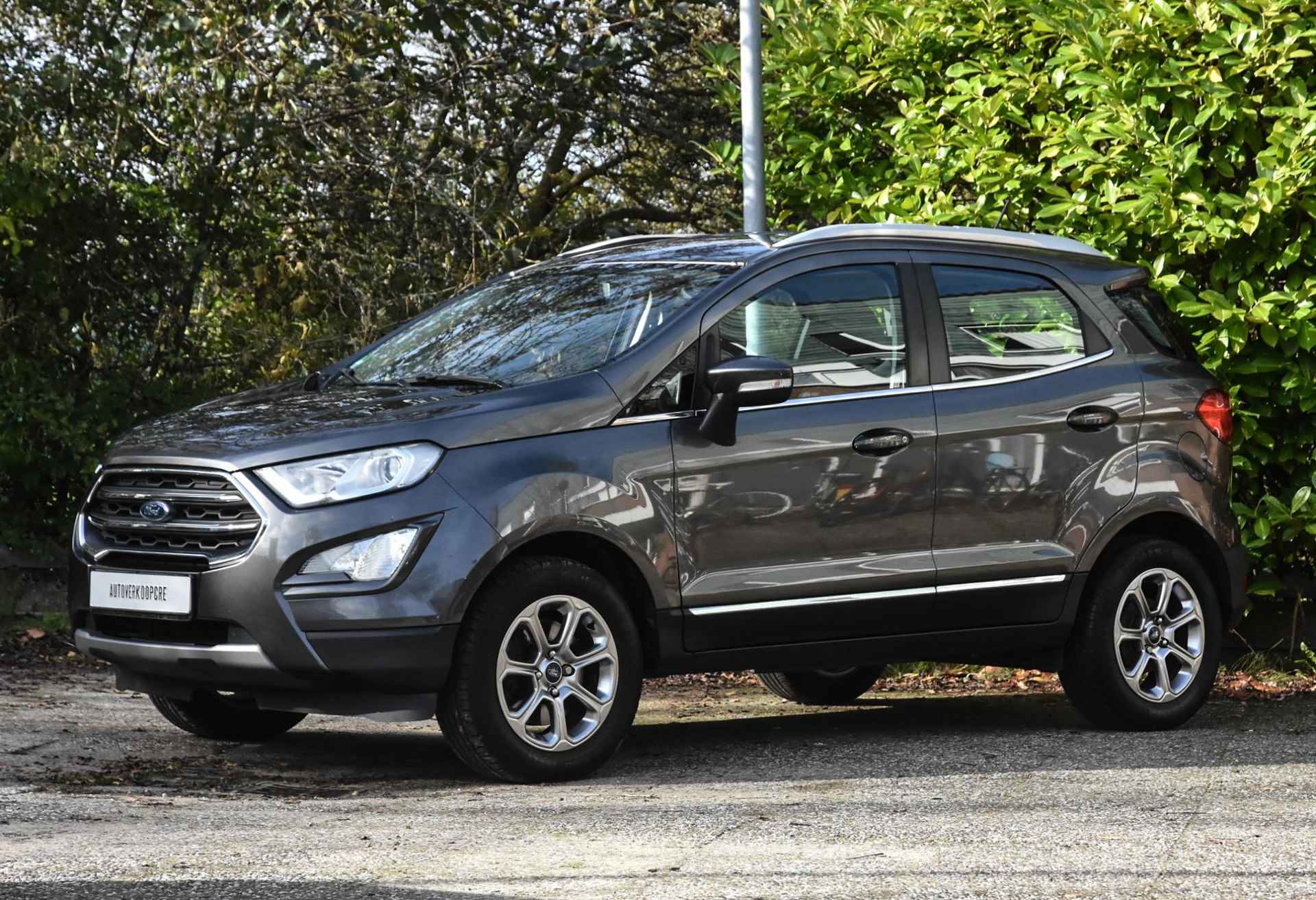 Ford EcoSport 1.0 EcoBoost Titanium automaat / verwarmd stuur / stoelverwarming / cruise control / navi / airco / half leer/half stof - 34/38