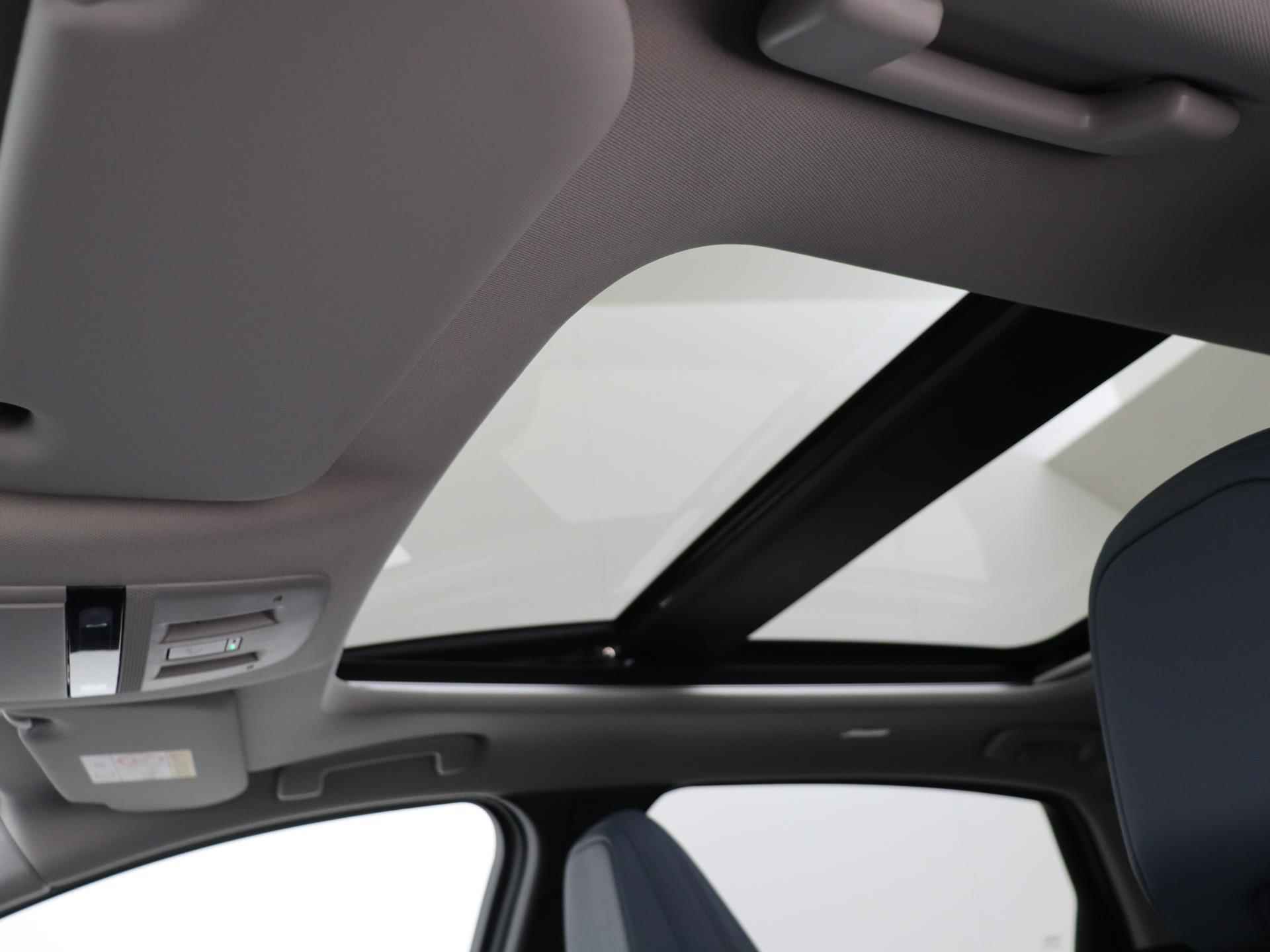 Nissan Ariya 91 kWh - 240PK Evolve | NIEUW op kenteken | Apple Carplay/Android Auto | Navigatie | 360 camera | 19 inch Velgen | LED Lampen | Parkeersensoren | Verwarmbare voorruit | Stoel & Stuurwiel verwarming | Cruise Control | Climate Control | - 27/31